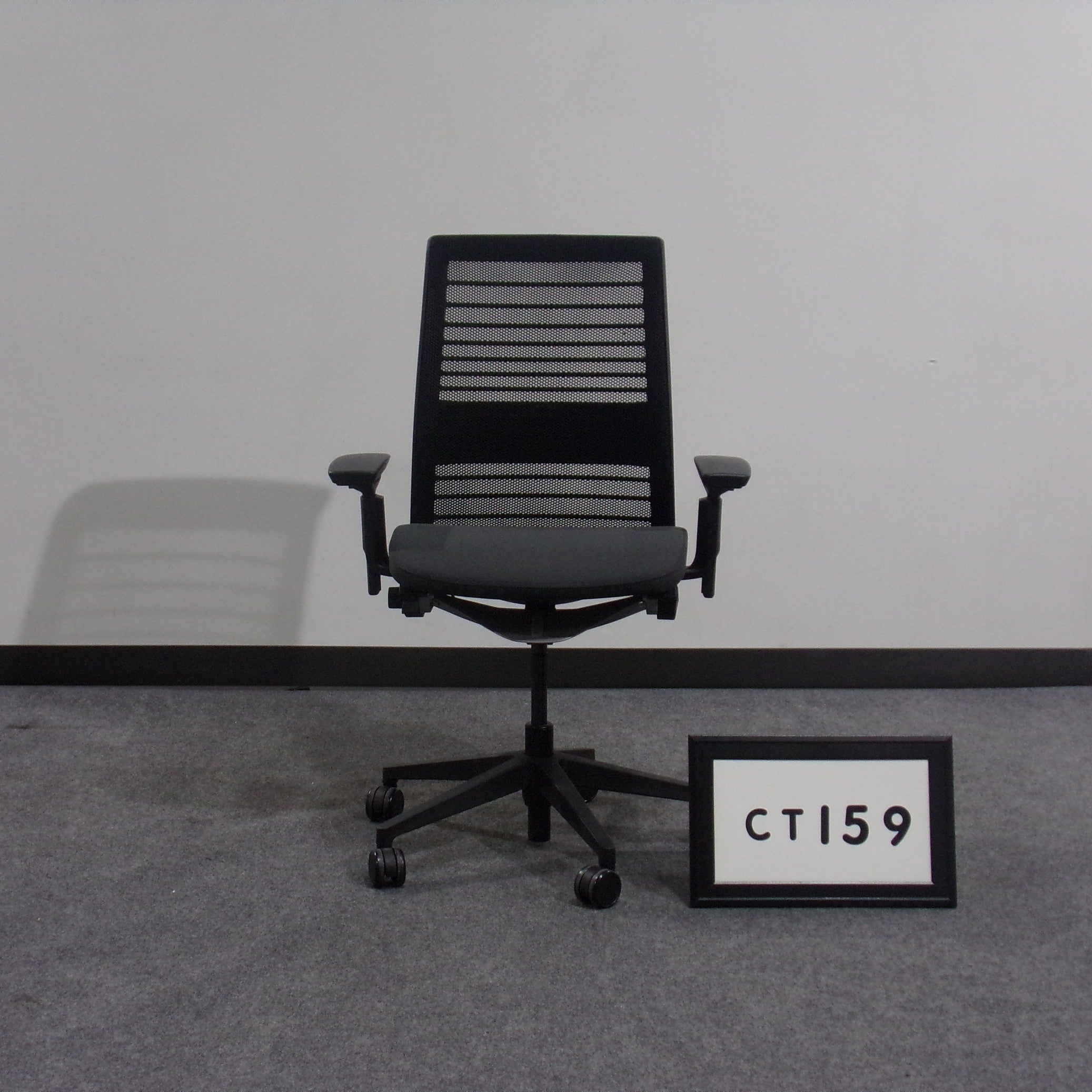 SteelcaseThink chair High back Mesh back Grey fabric patterned seat Seat slider. Adjustable arms