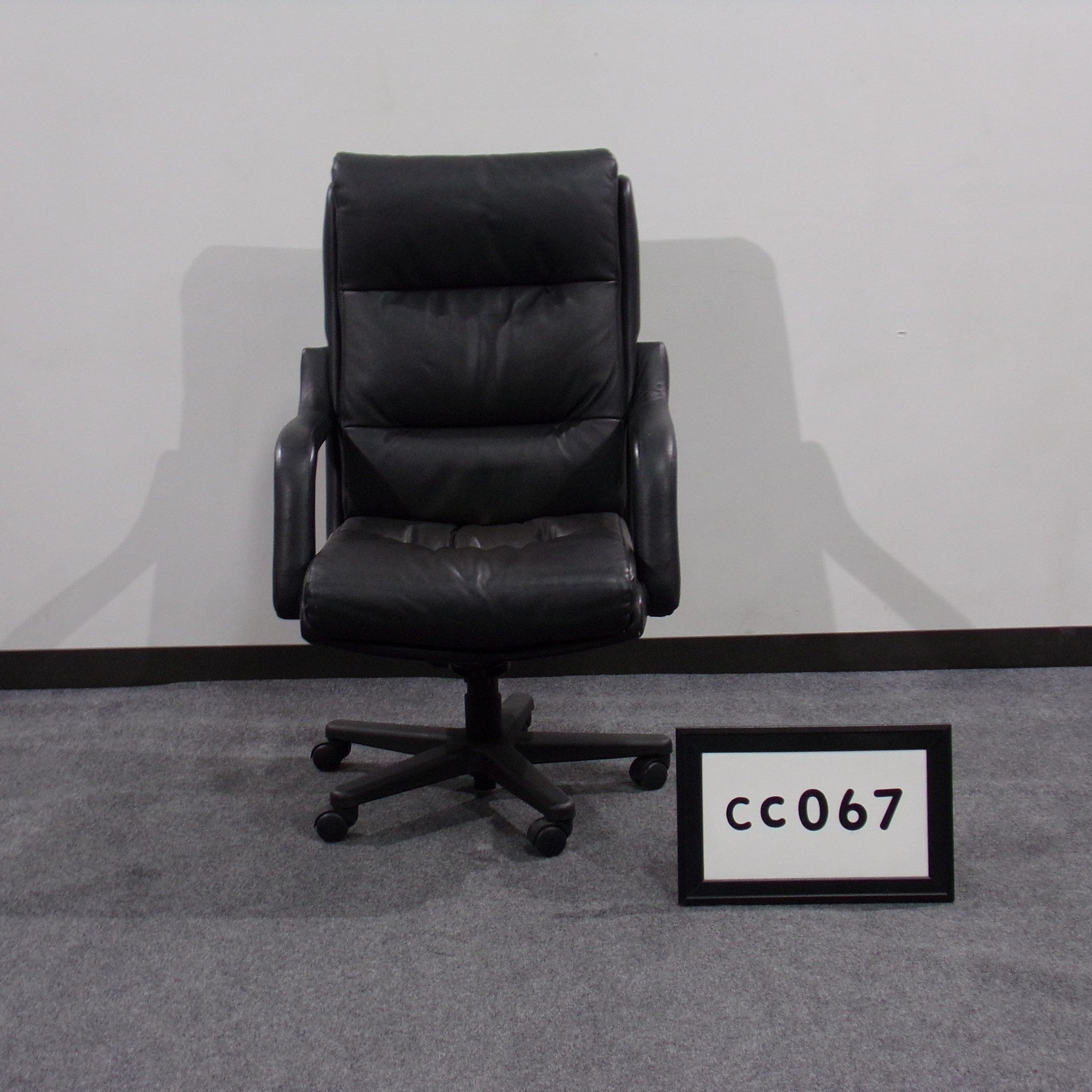 Conference chair  black leather with padded arms