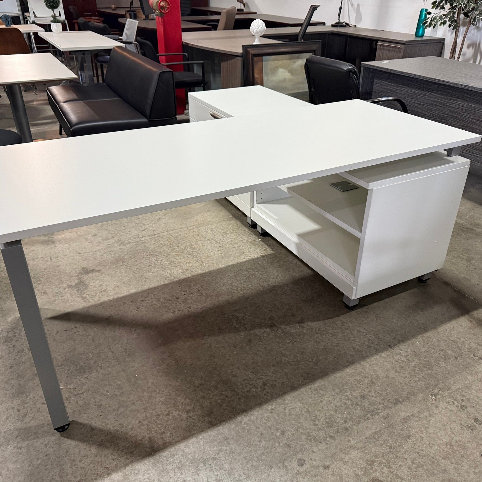 New White laminate L shaped desk open with low credenza with open sheves and BF