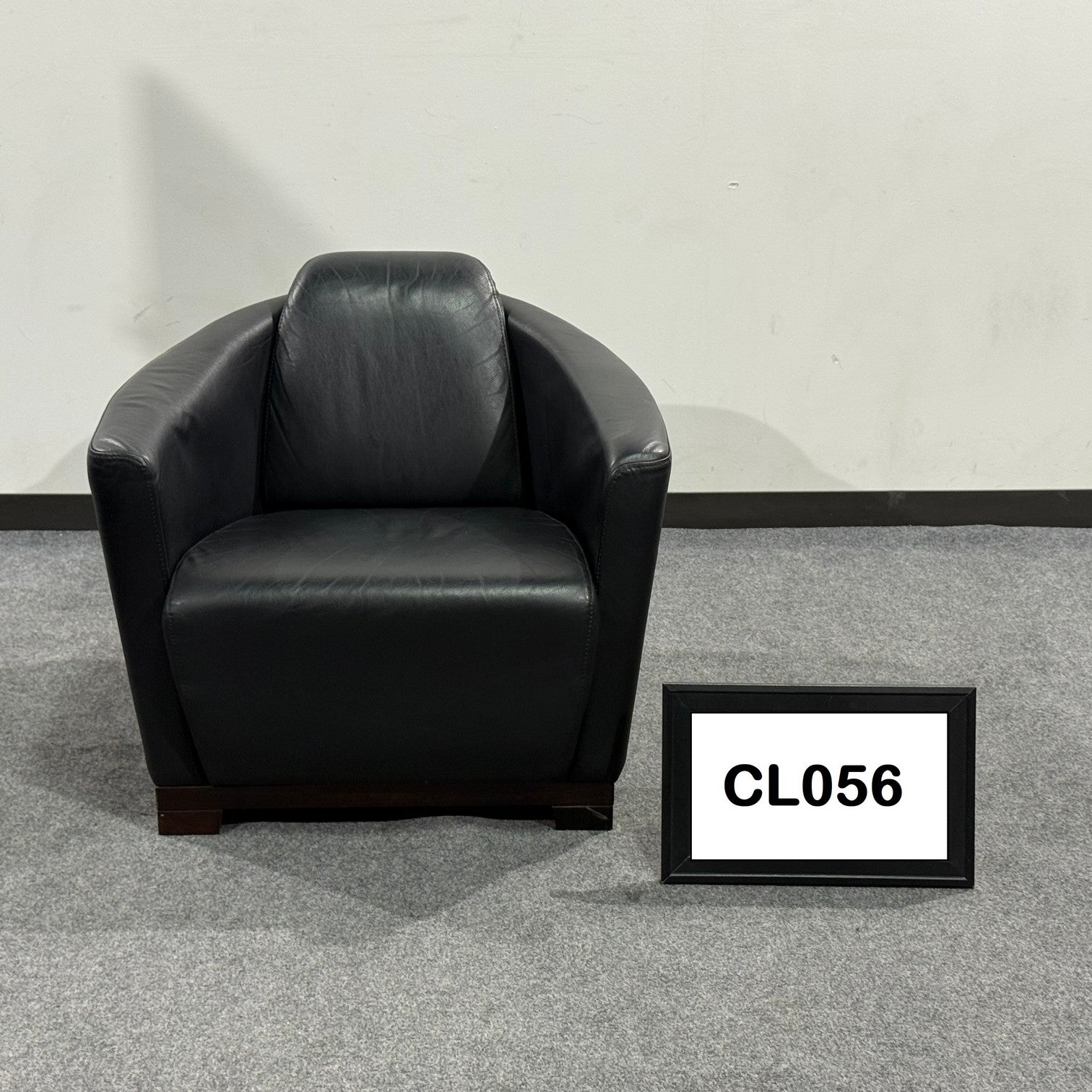 Calia Italia Black leather club chairs