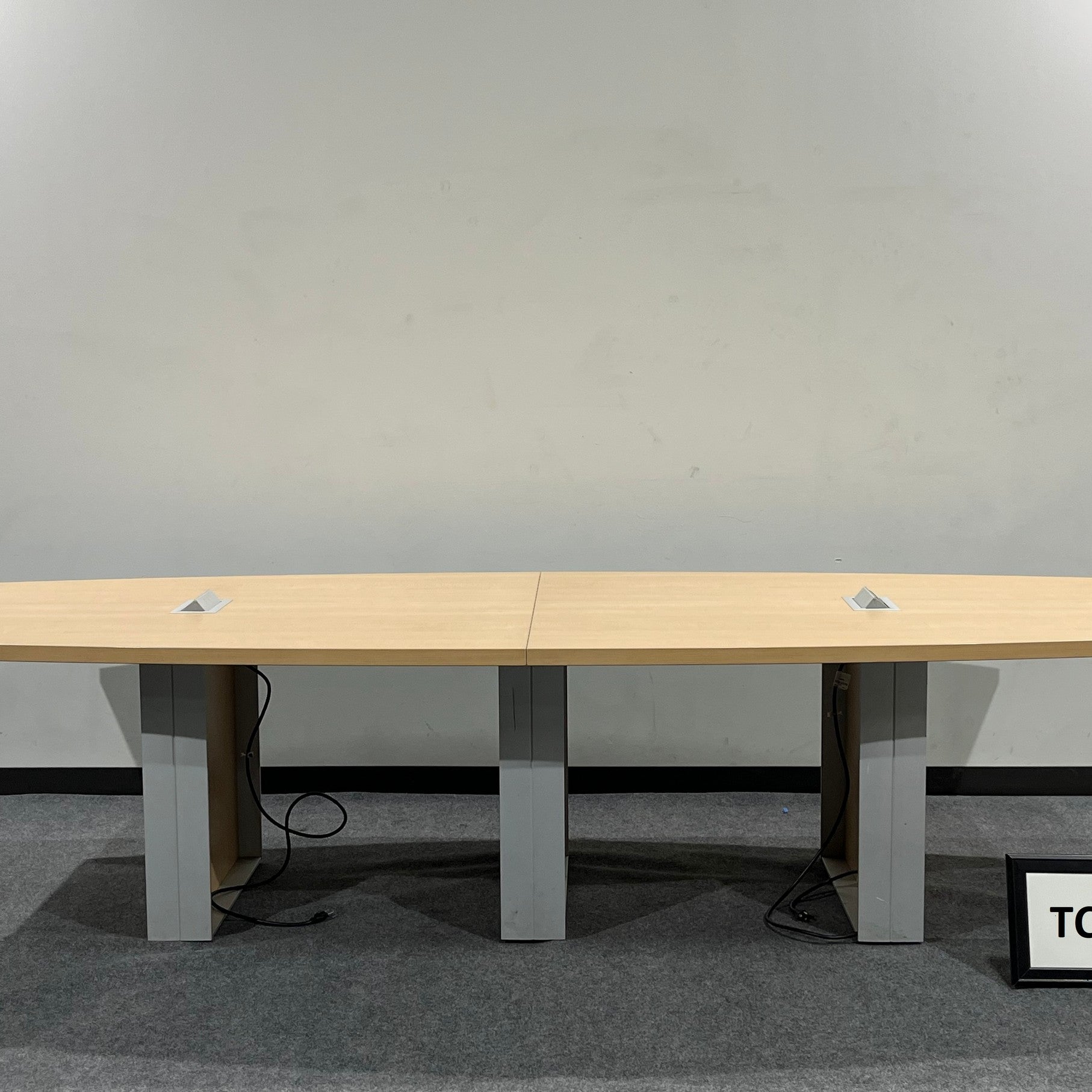 Maple laminate conference table 10' x 4' with 2 power modules with slab base