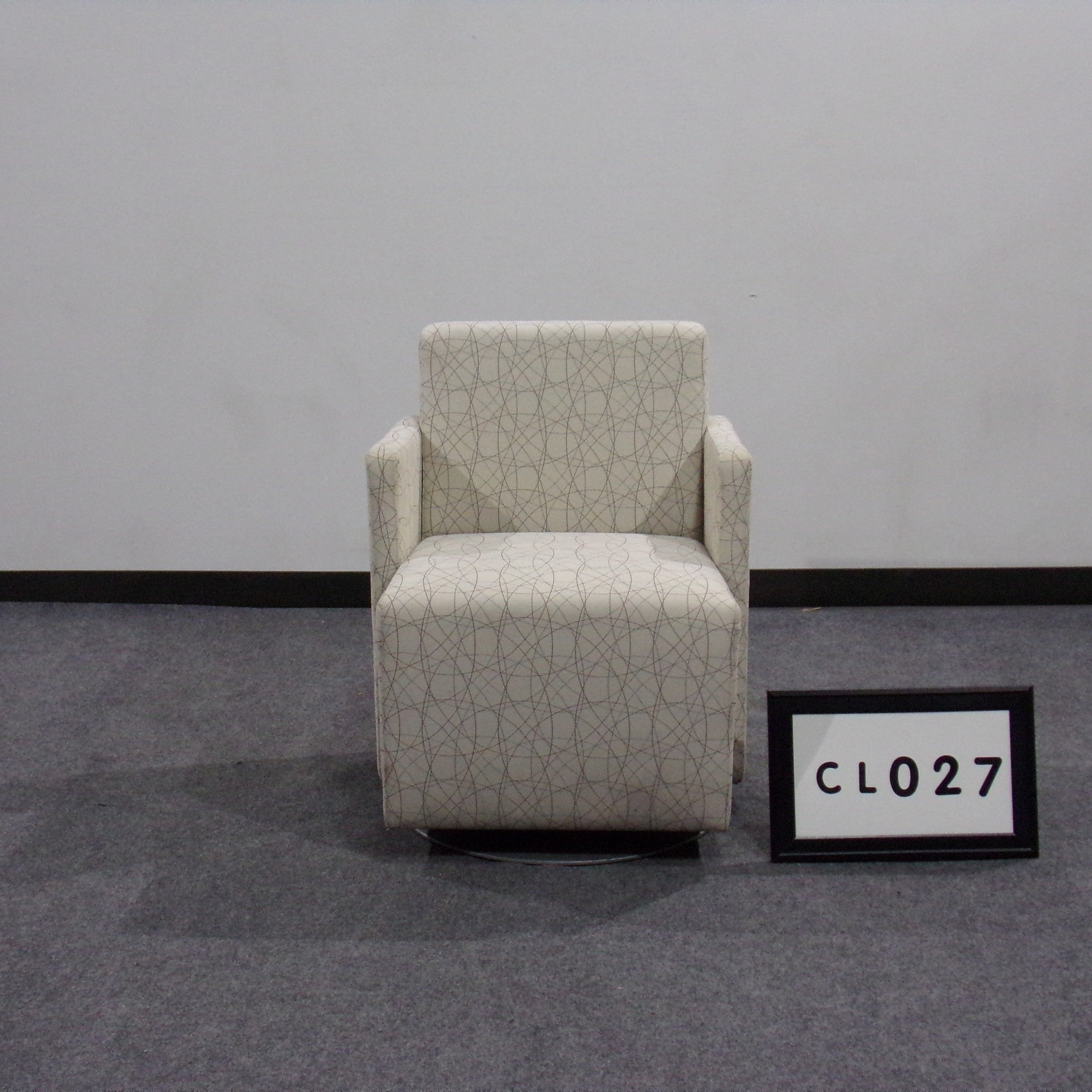OFS Gunlocke Lounge Chair Beige fabric with brown and grey pattern Self centering swivel base