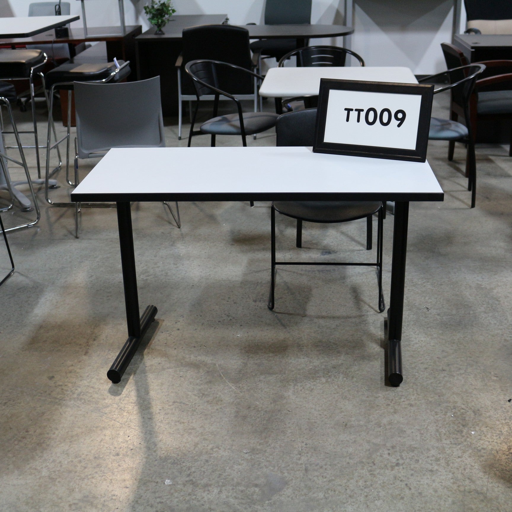 Training table grey laminate with black t-mold edge with black T legs 48" x 24"
