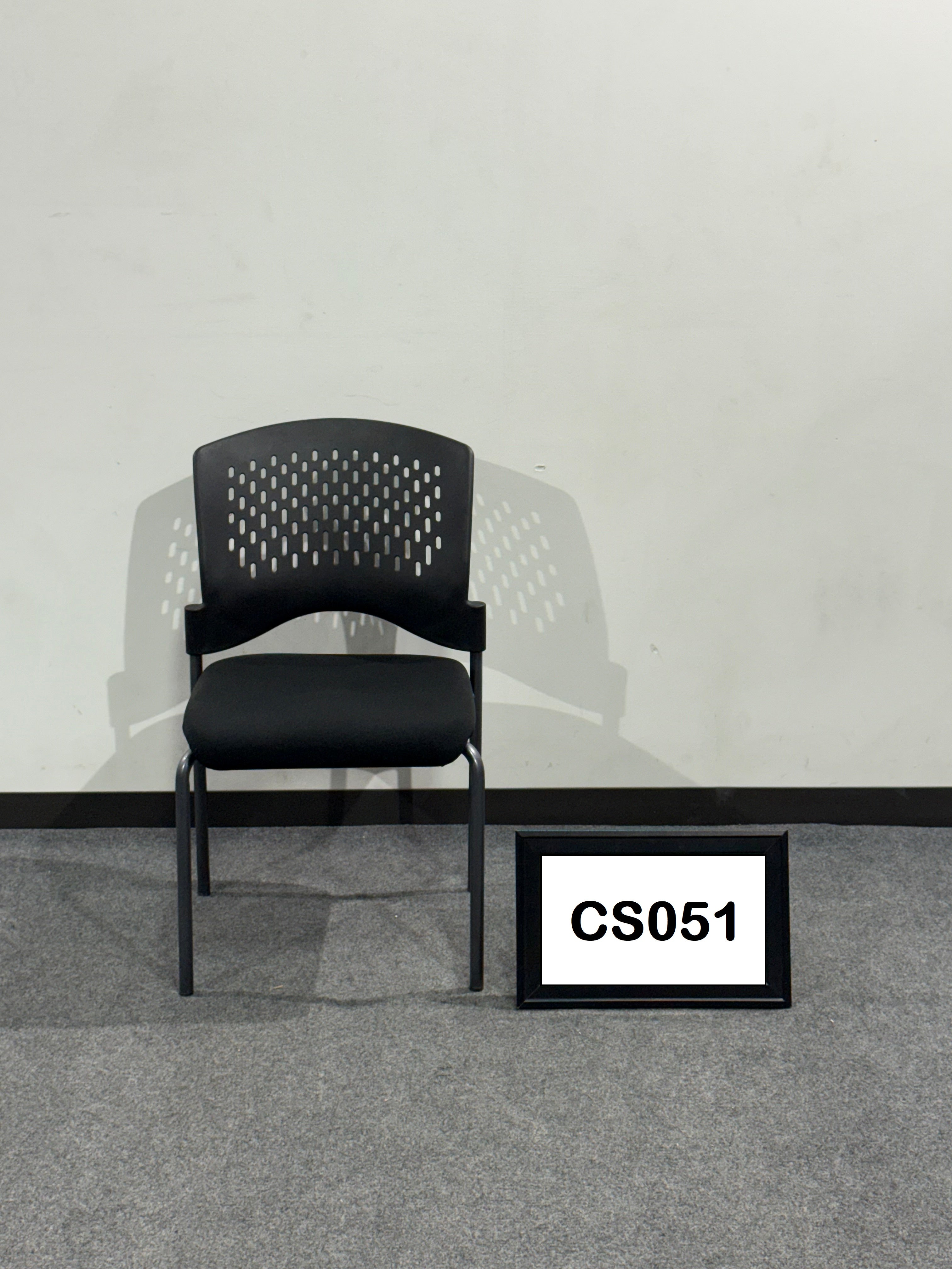 Stack chairs perforated back with black fabric seat armless