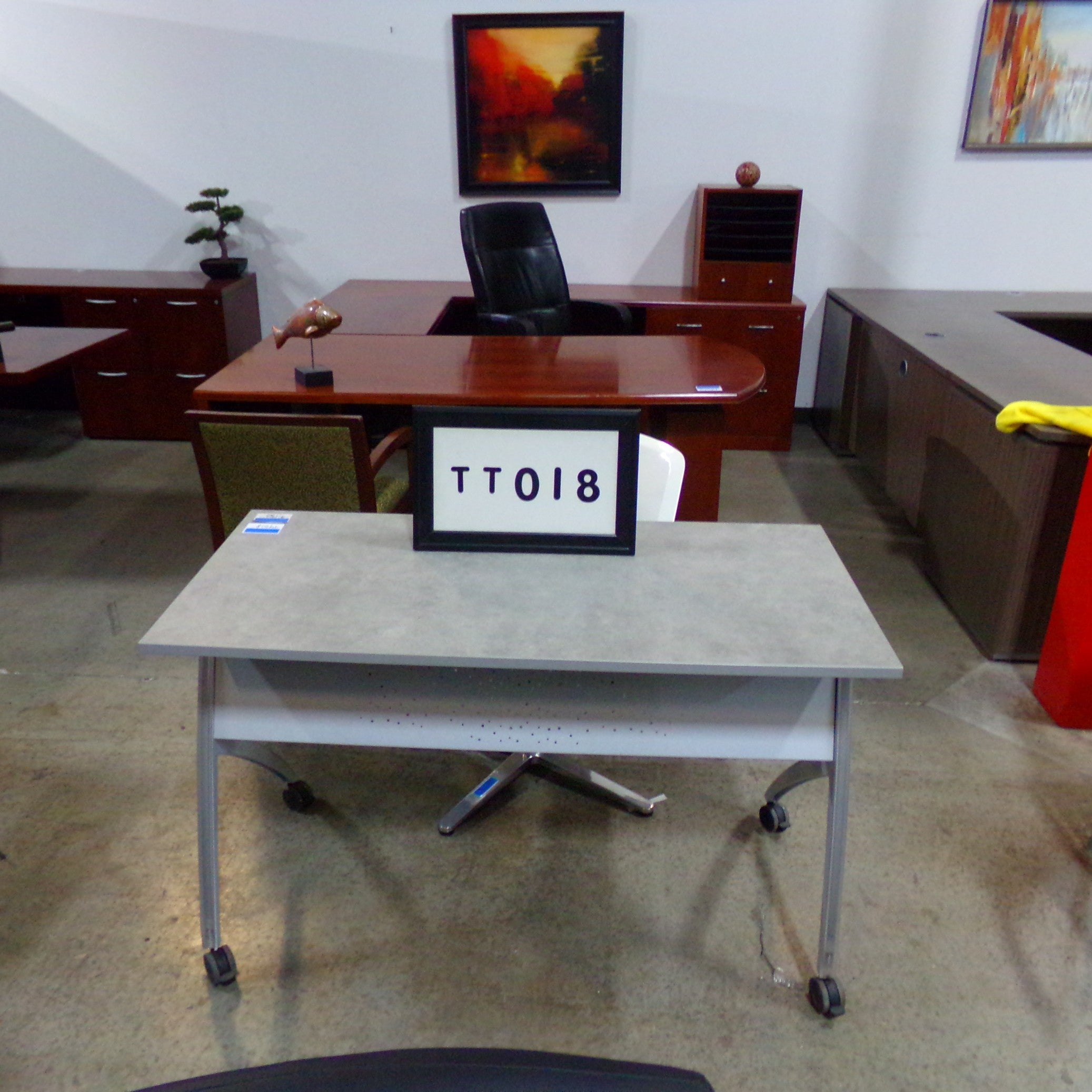 Versteel training table Gray laminate flip top..Silver base with locking casters 48" x 24"