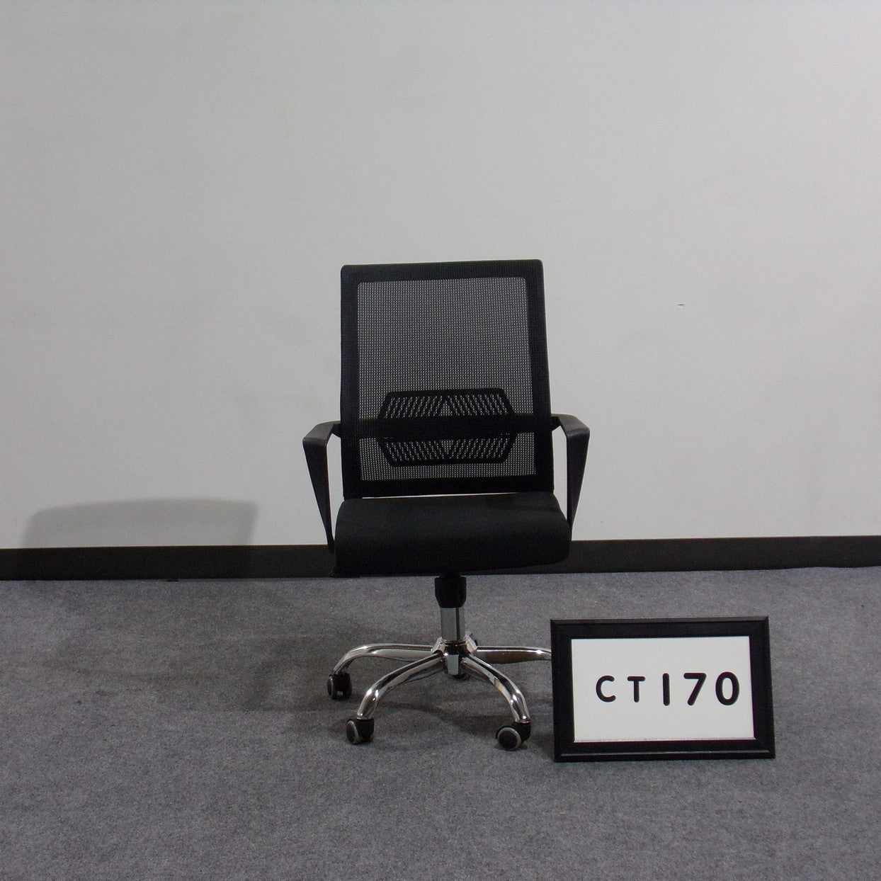 Task chair Mid back Black mesh back Black fabric seat Height adjustable Tilt lock Chrome base
