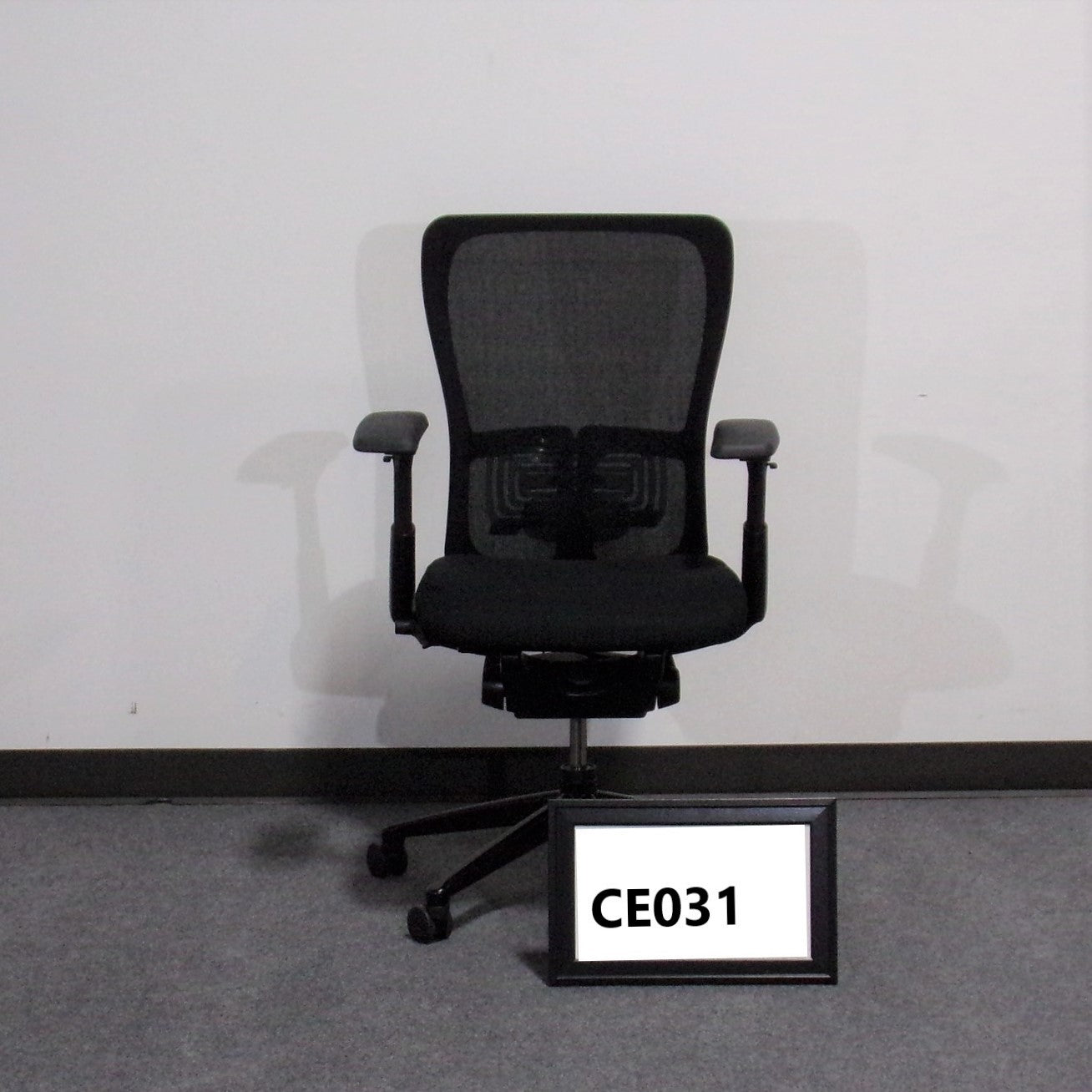 Haworth Zody Executive Chair black seat and back with  adjustable arms and seat slider