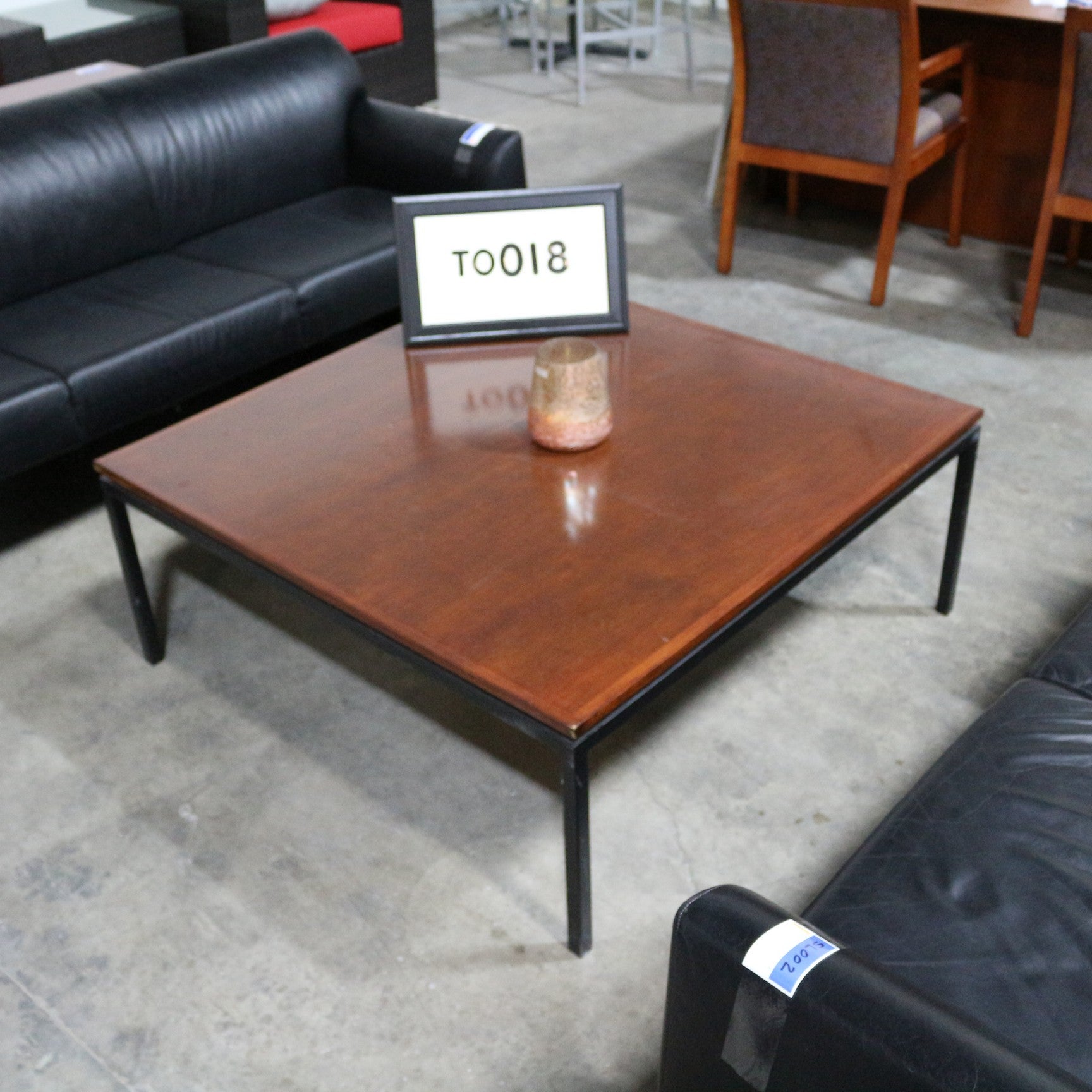 Coffee table 42" x 42" cherry wood with black legs