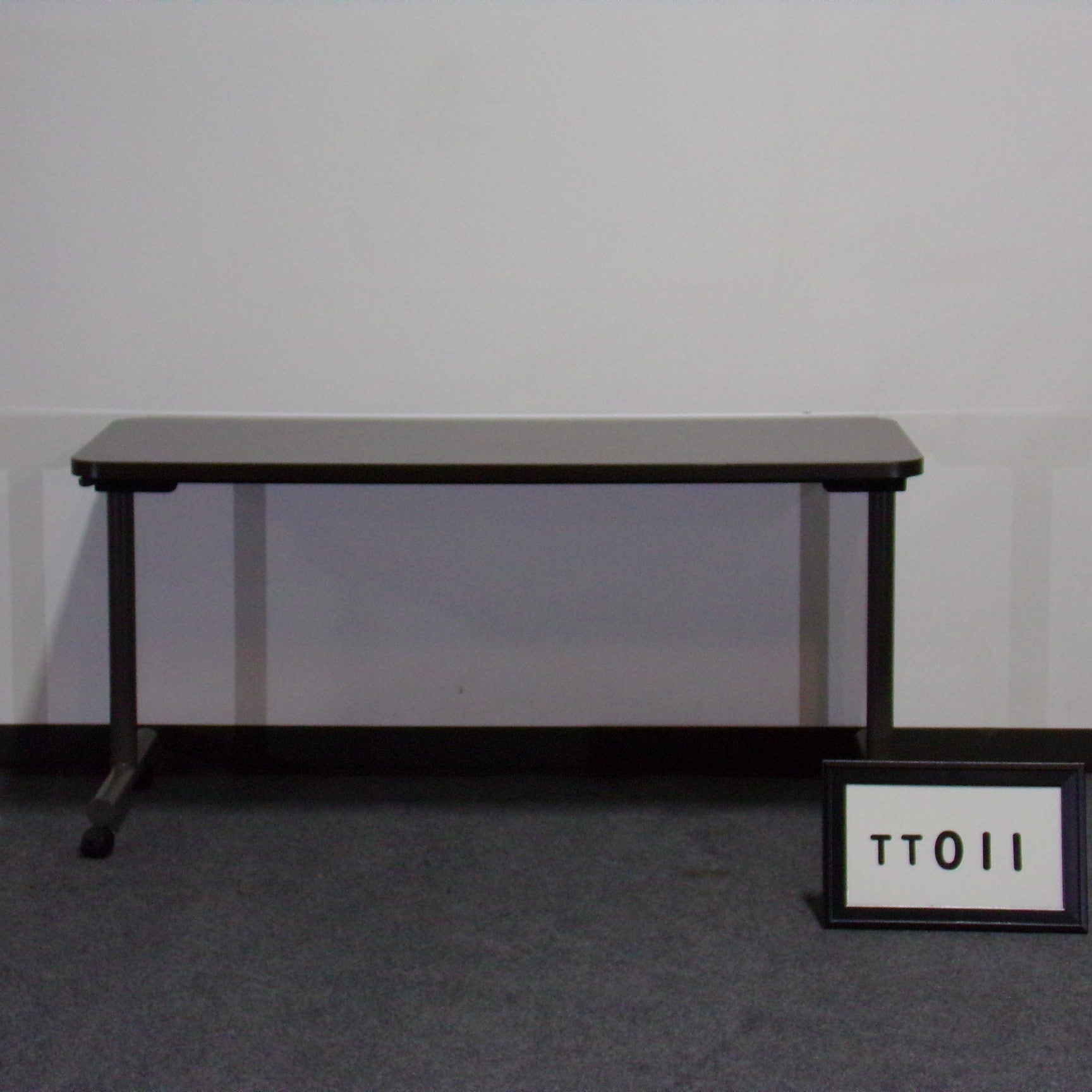 Herman Miller Espresso laminate training table..Folding grey T-legs with casters..60" x 24"