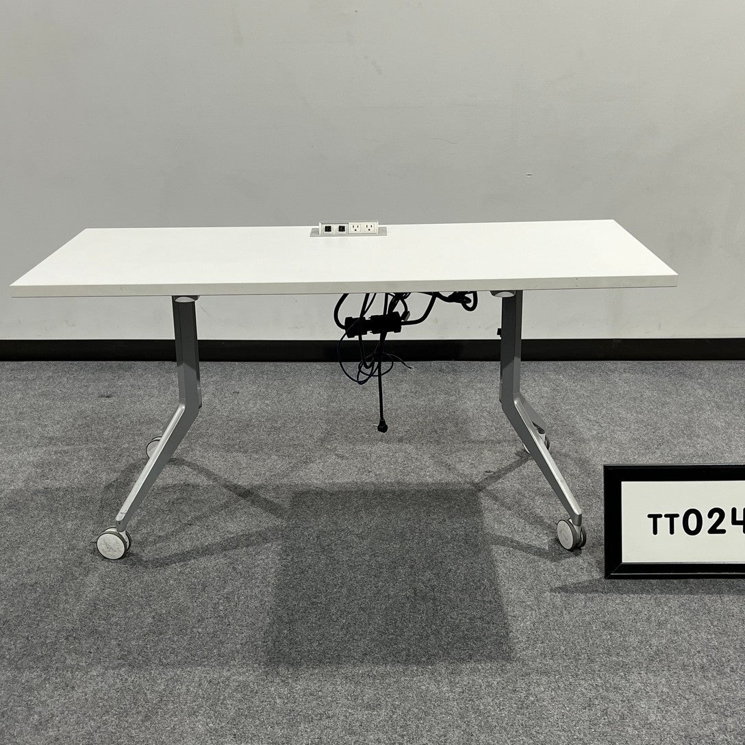 Haworth Folding Training Table White laminate with power station/ silver legs and casters. 60" x 25"