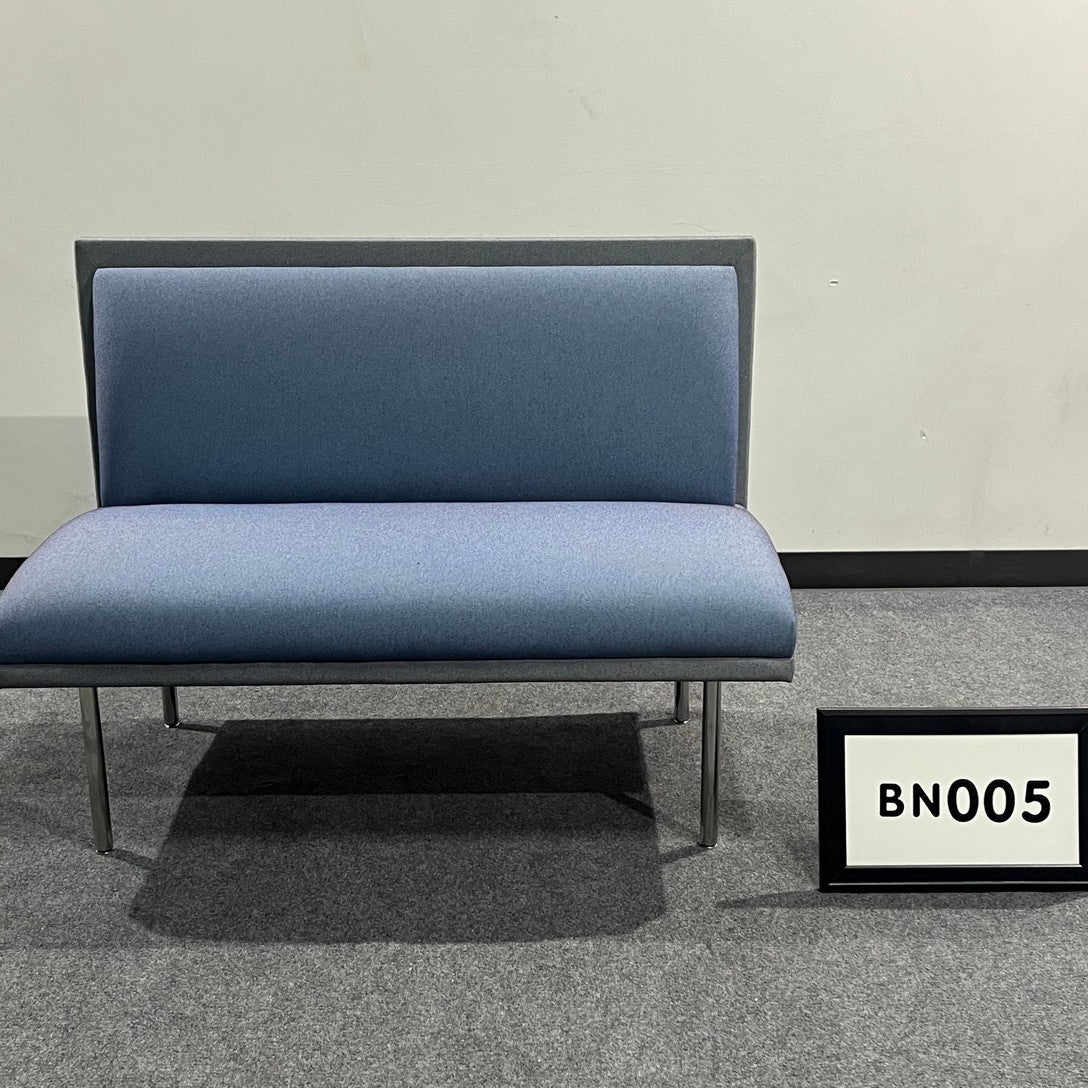 Bench blue fabric seating an back with Chrome base and legs
