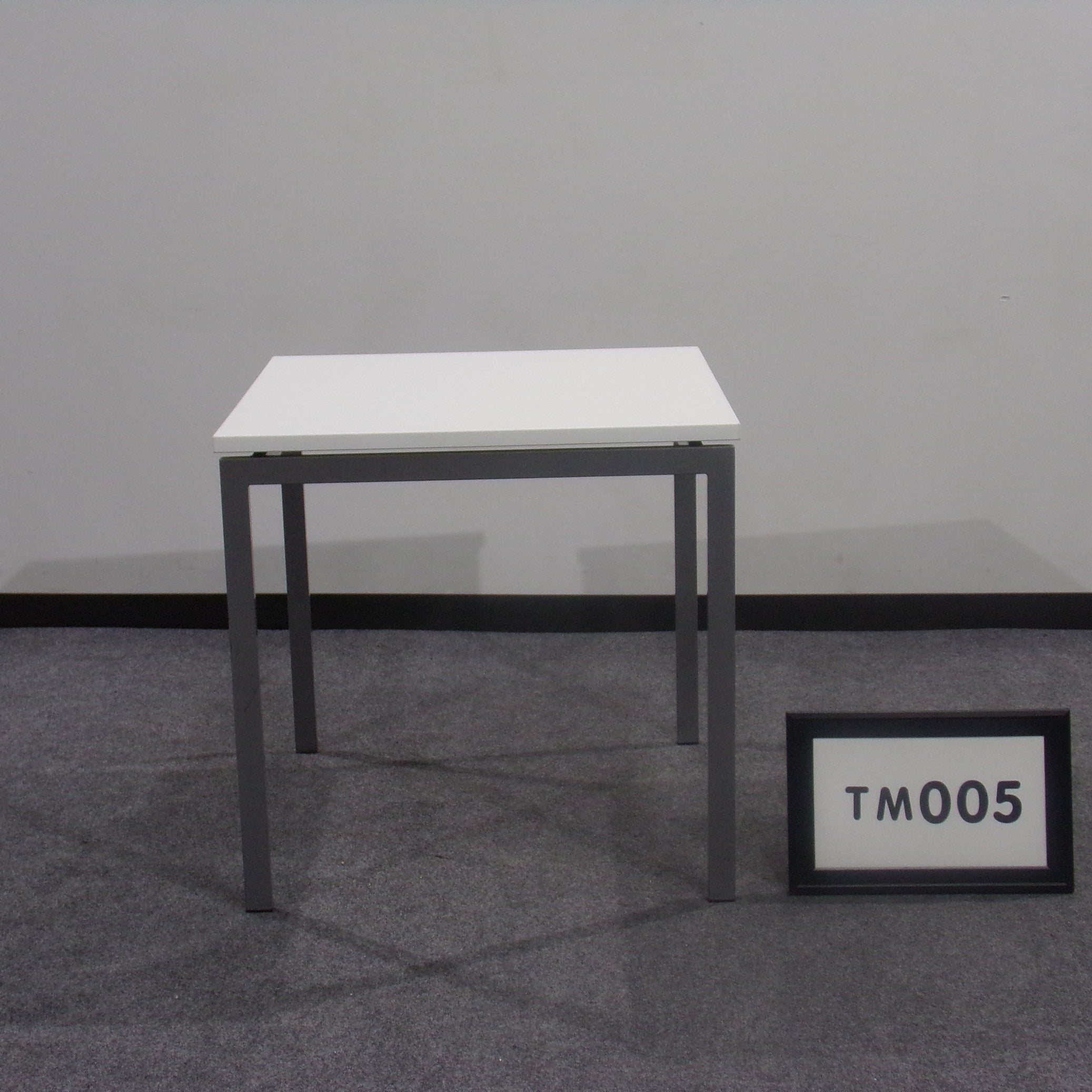 White laminate square meeting table with grey metal legs