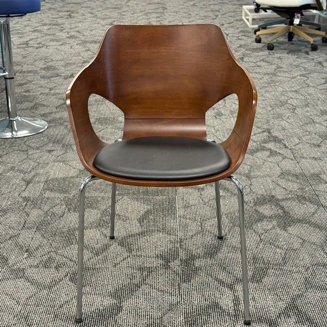 Wood back elephant chair with black vinyl seat