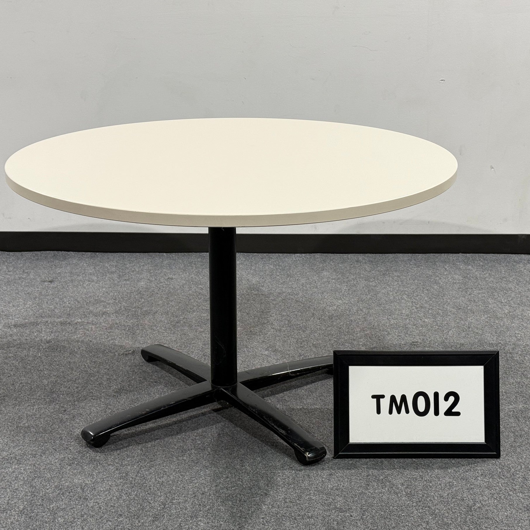Meeting table 48" beige laminate with black x base