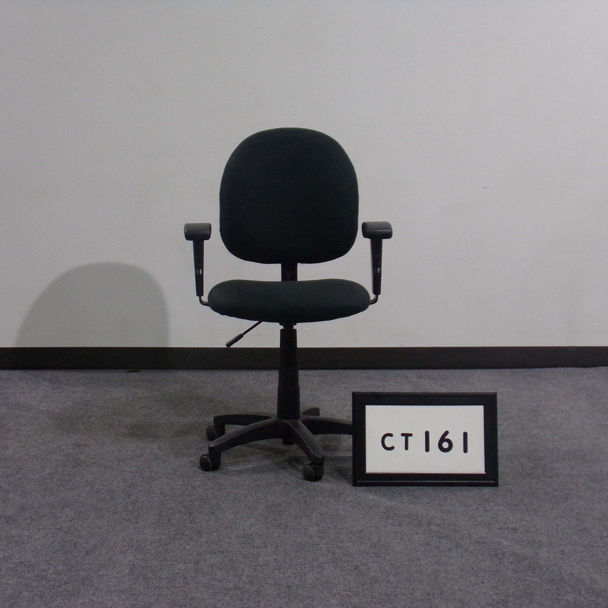 Task chair Dark gray fabric seat and back Adjustable arms Seat is height adjustable