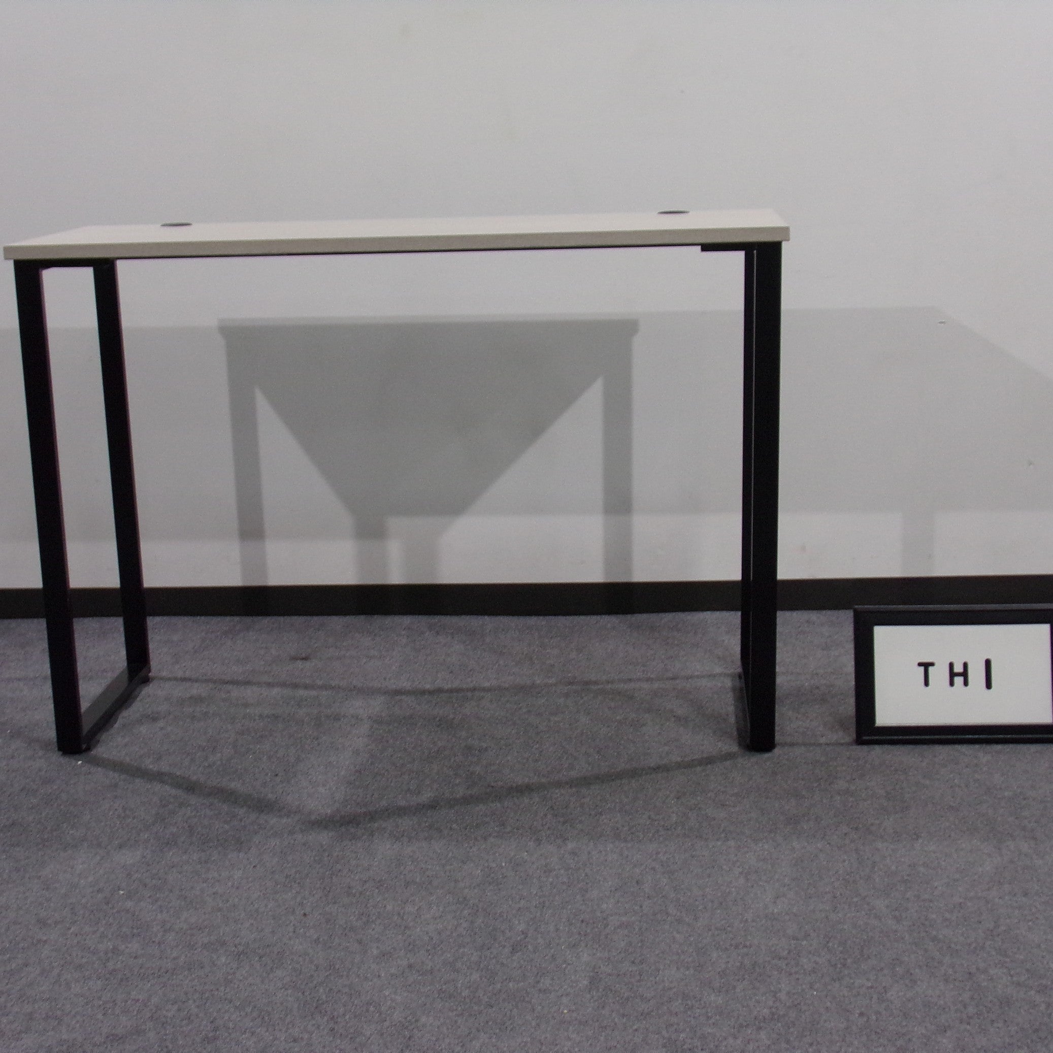 High top table laminated with black metal base
