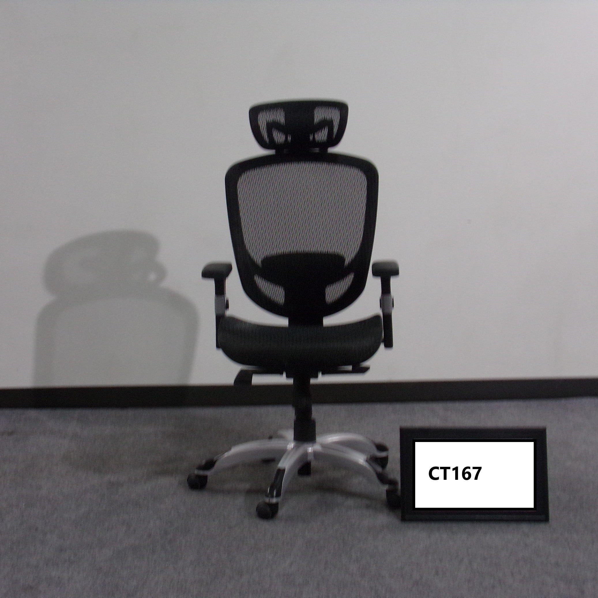 Black task chair Mesh back, seat, headrest Height adjustable Tilt lock Height adjustable arms