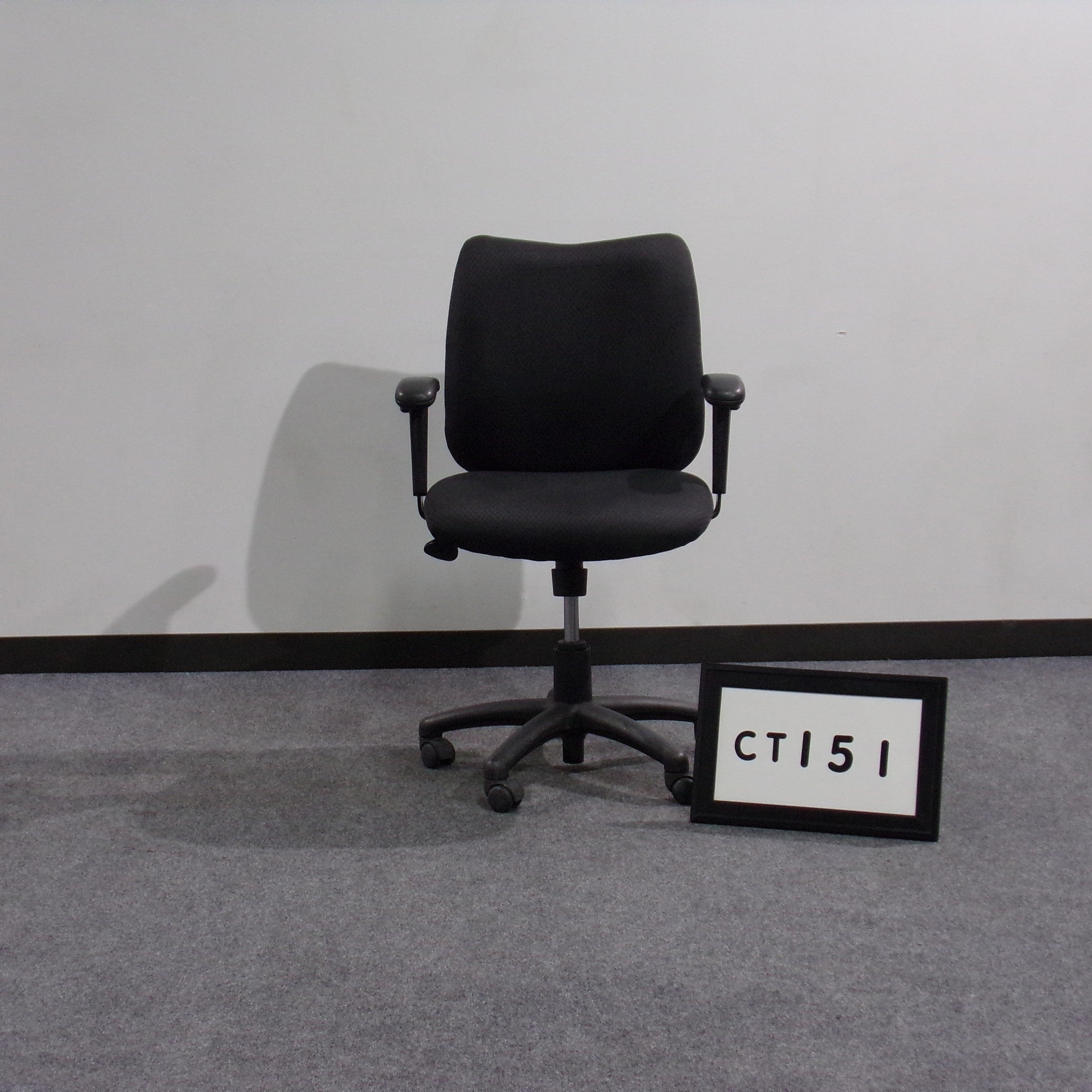 Task chair Black fabric seat and back Height adjustable Adjustable arms