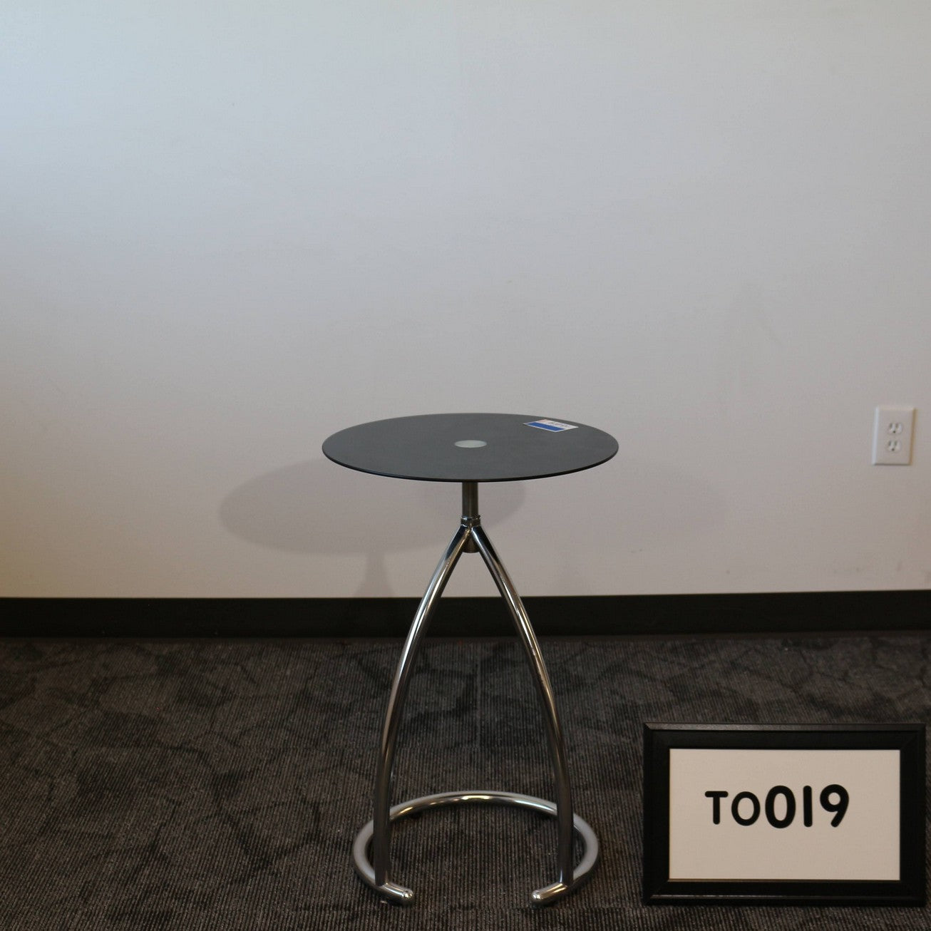 18" round black glass occasional table with tunular chrome base