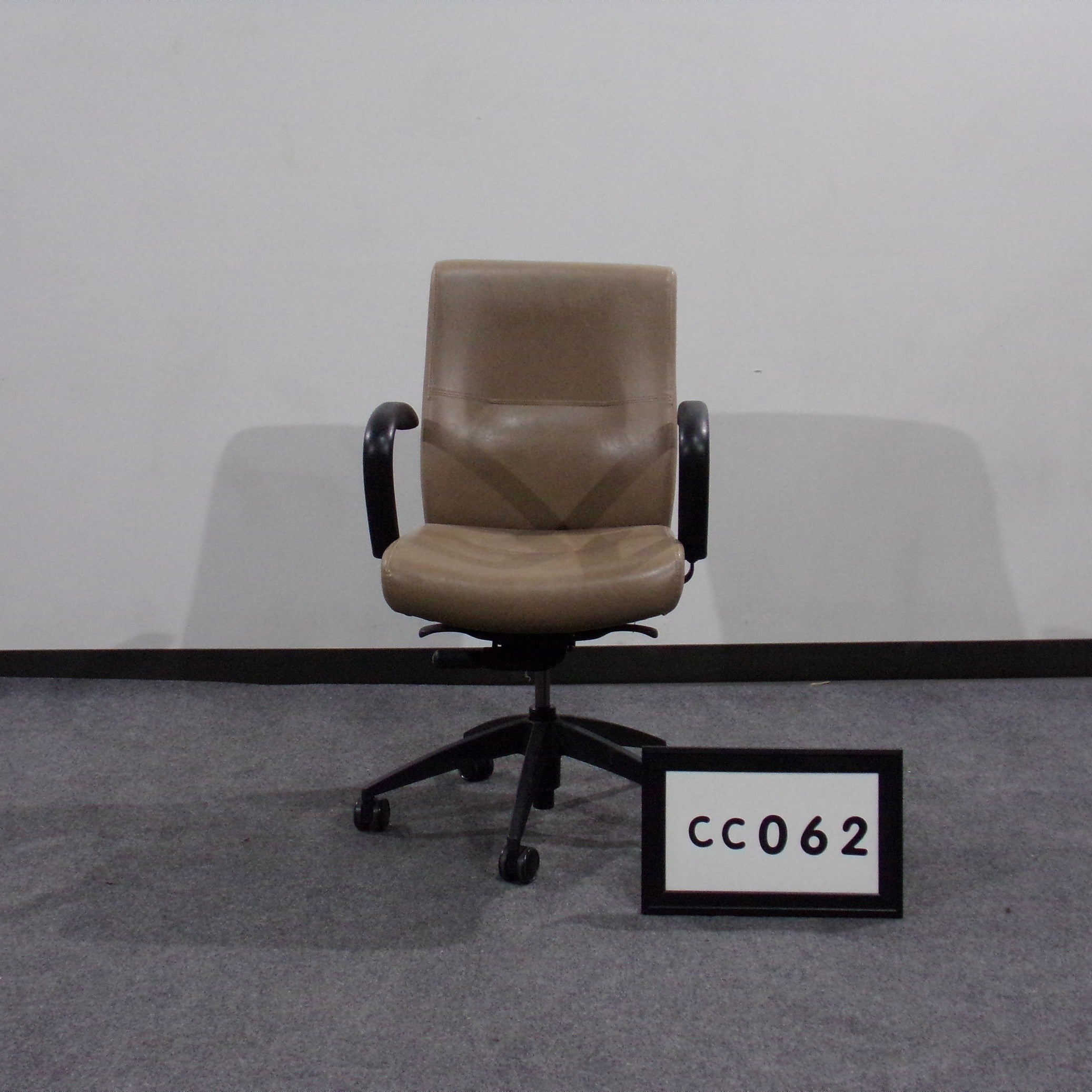 9to5 Cortana midback conference chair Tan leather seat & back Black padded arms Tilt back w/ lock