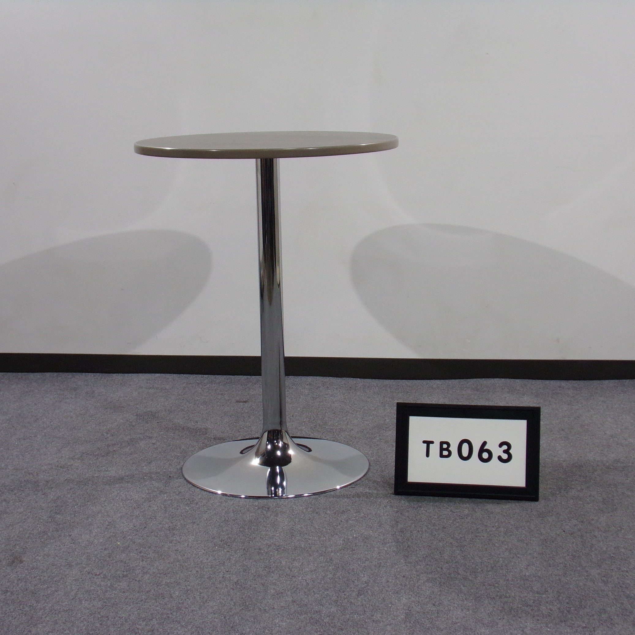 Cafe' height table with chrome trumpet base 32"d x 42"h