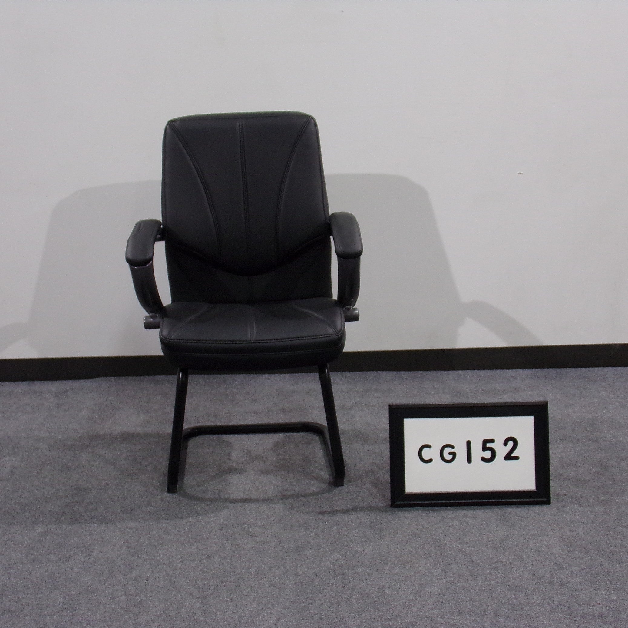Guest chair black vinyl with sled base