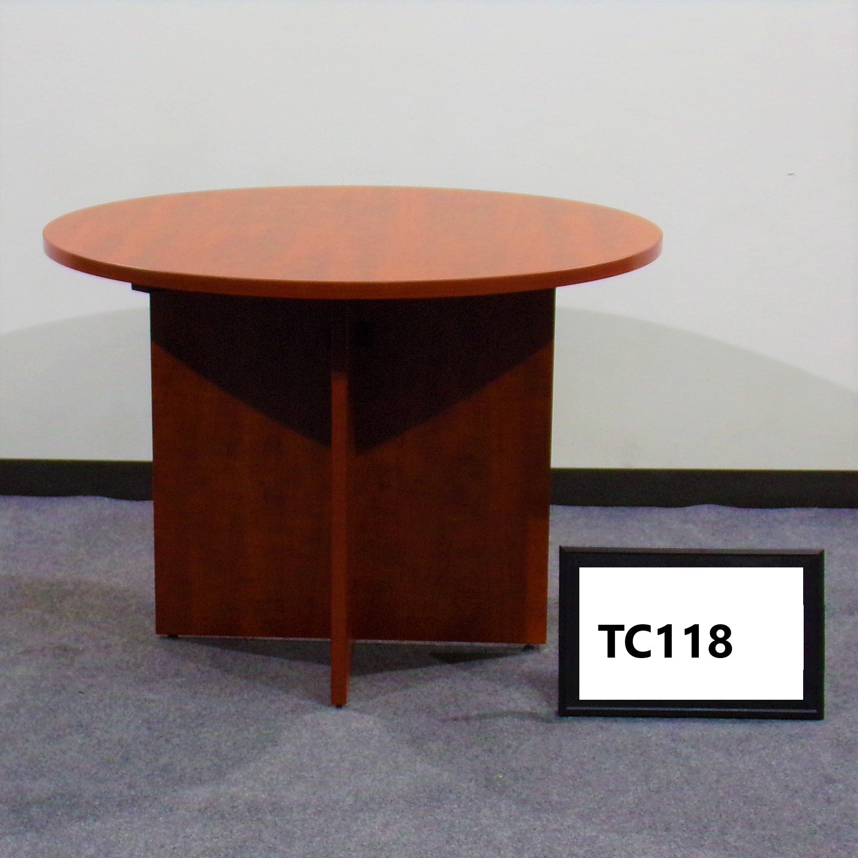 Cherry laminate conference table..42" round..X base
