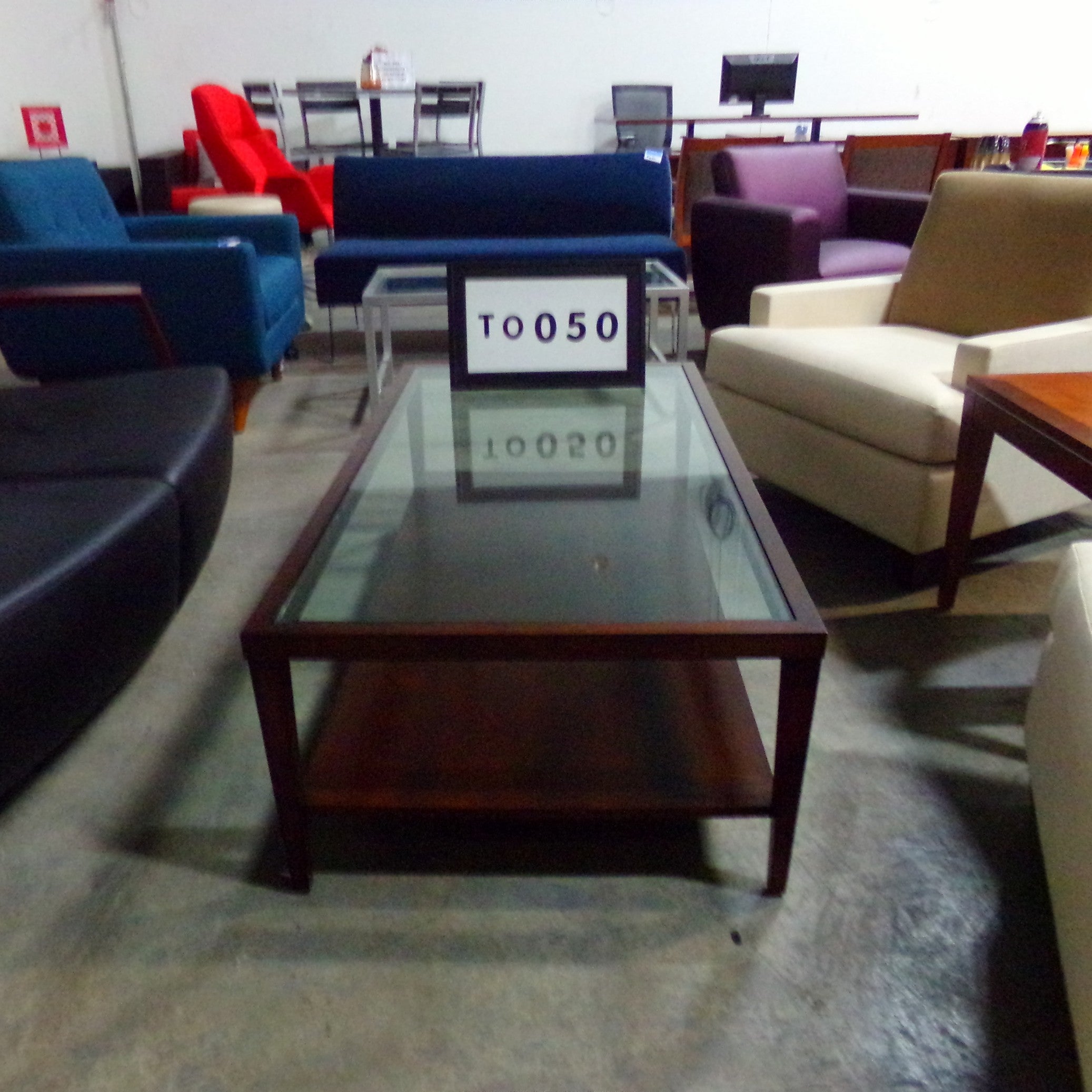 Espresso wood coffee table with glass insert.  54x28x17