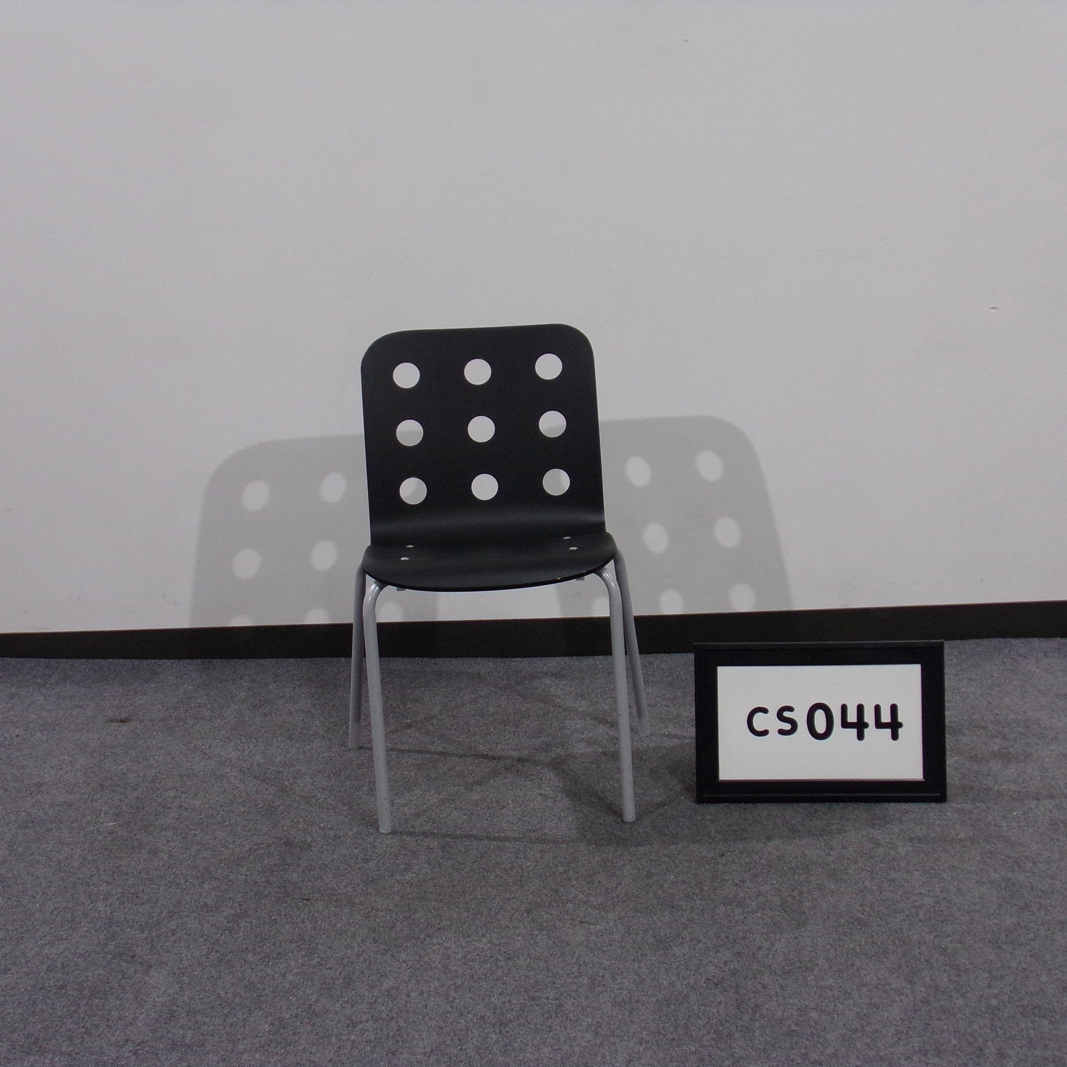 Stack chair black with gray metal legs