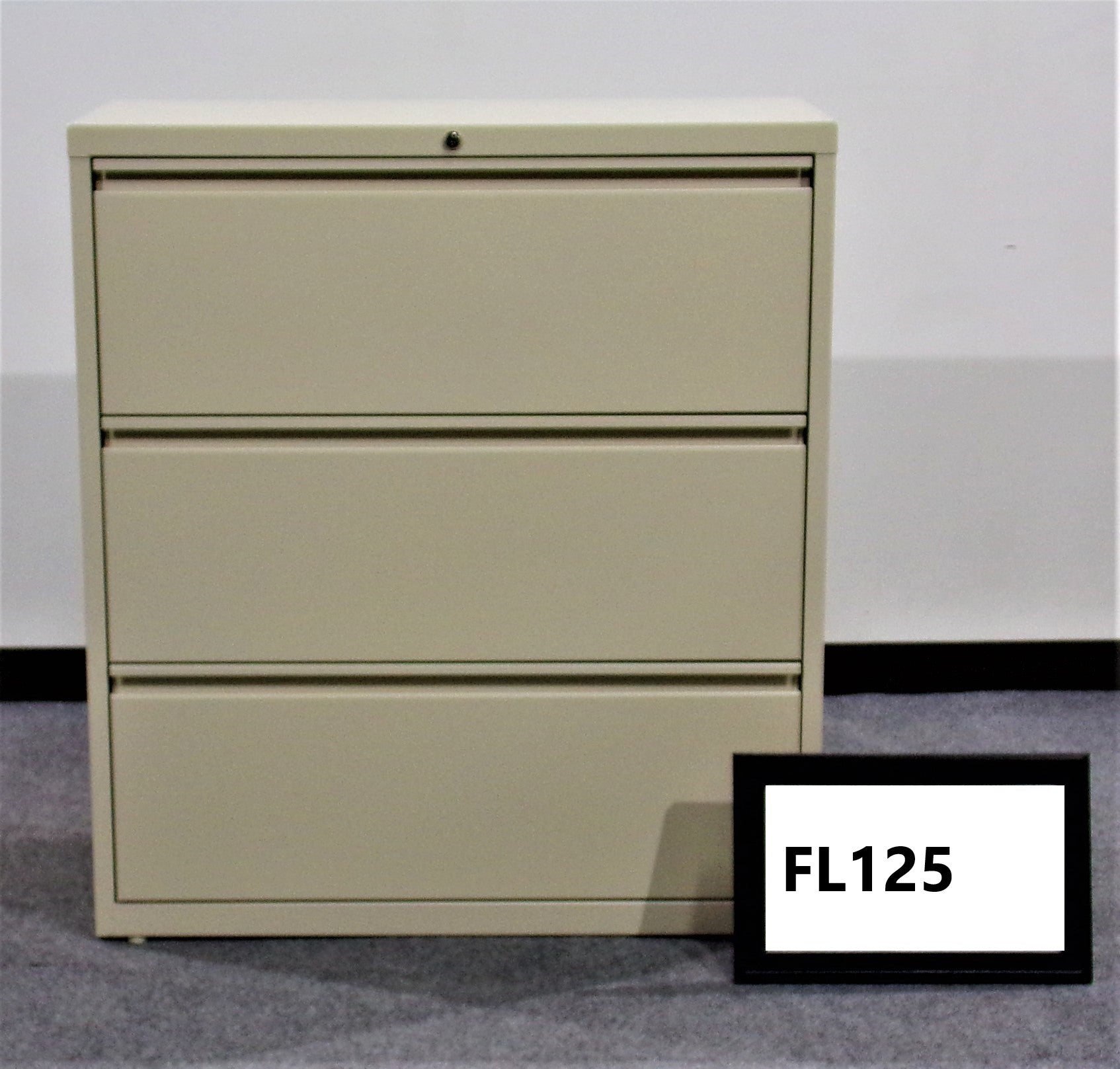 Taupe metal lateral file..3-drawer..36 x 19 x 40