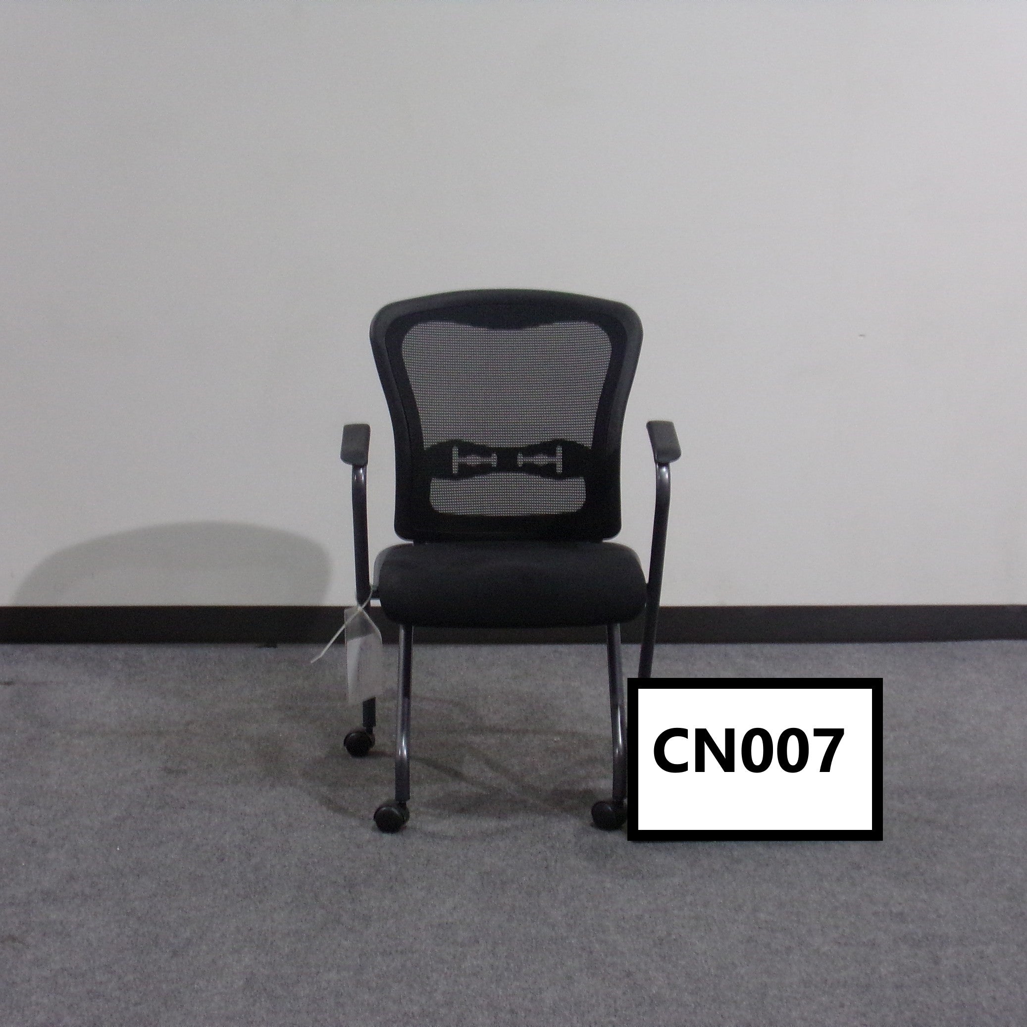 Cherryman "Eon" nesting chair Black midback meshback Black fabric seat Dark grey metal frame with