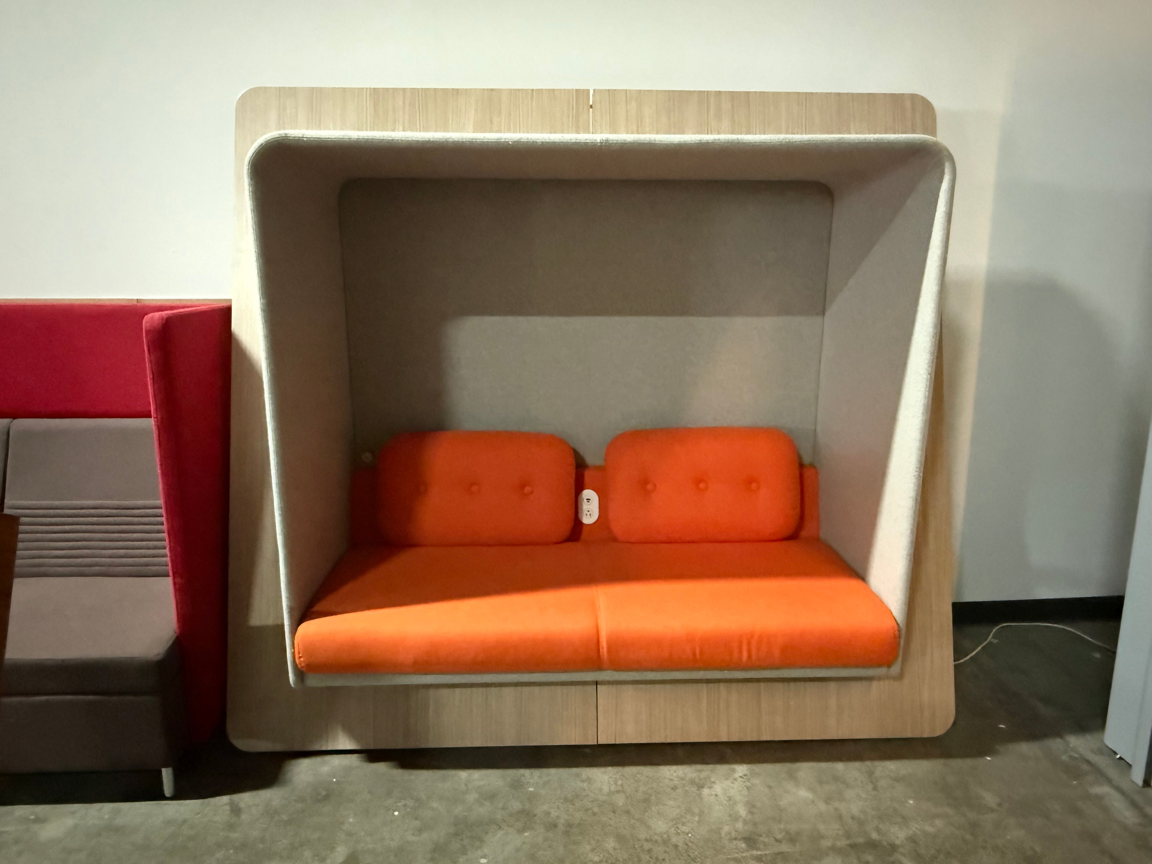 OFS Lean two sofa with surround  power and data orange and gray