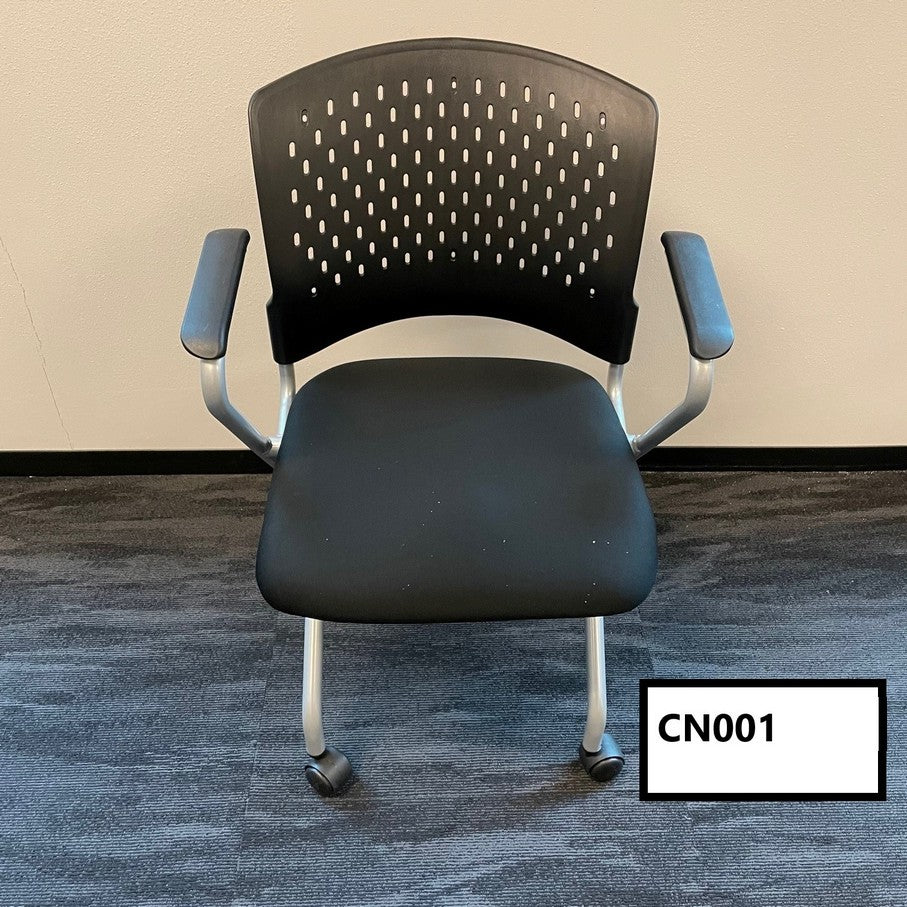 Black nesting chairs Fabric- cusioned seat Plastic ventilated back