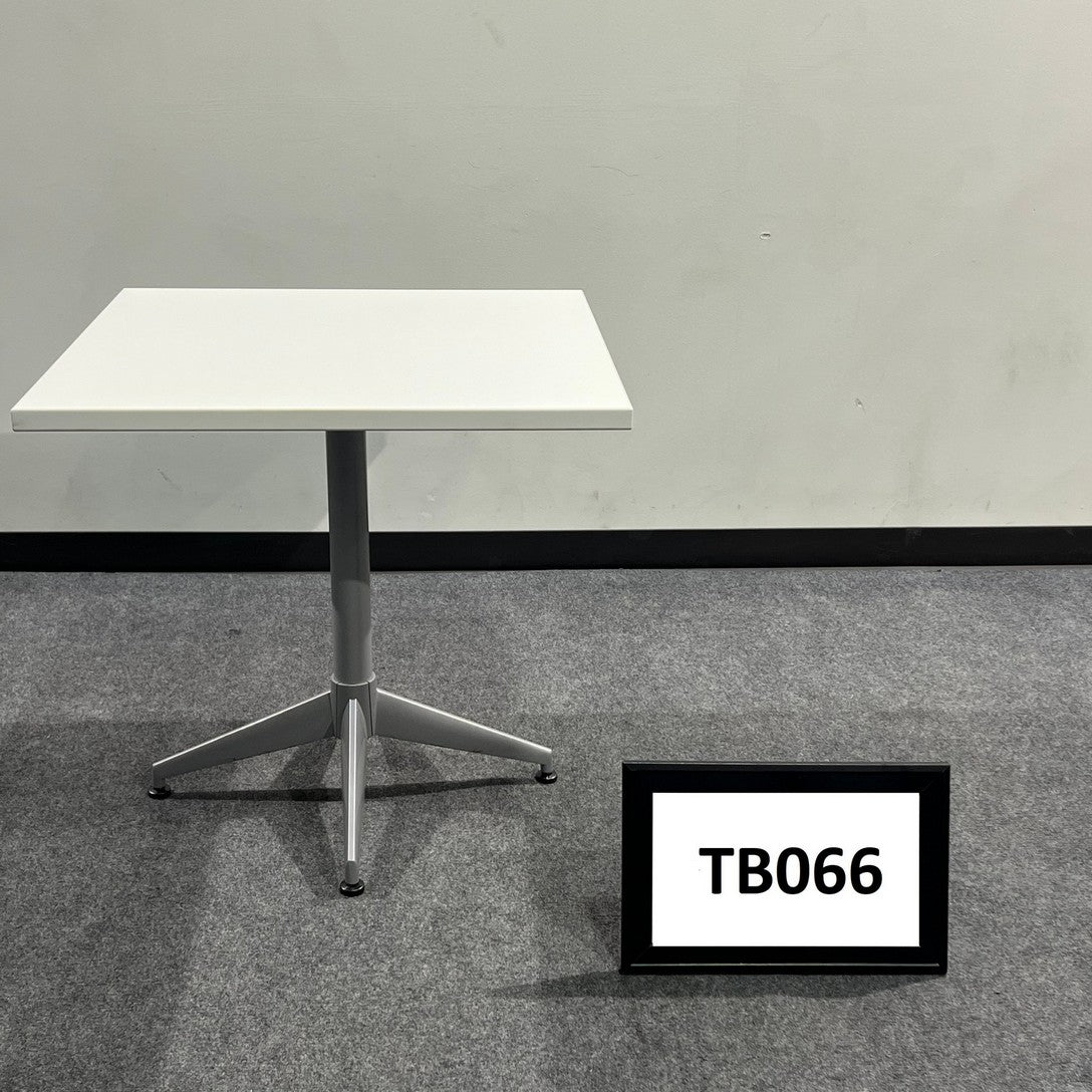 White laminate square table with metal legs
