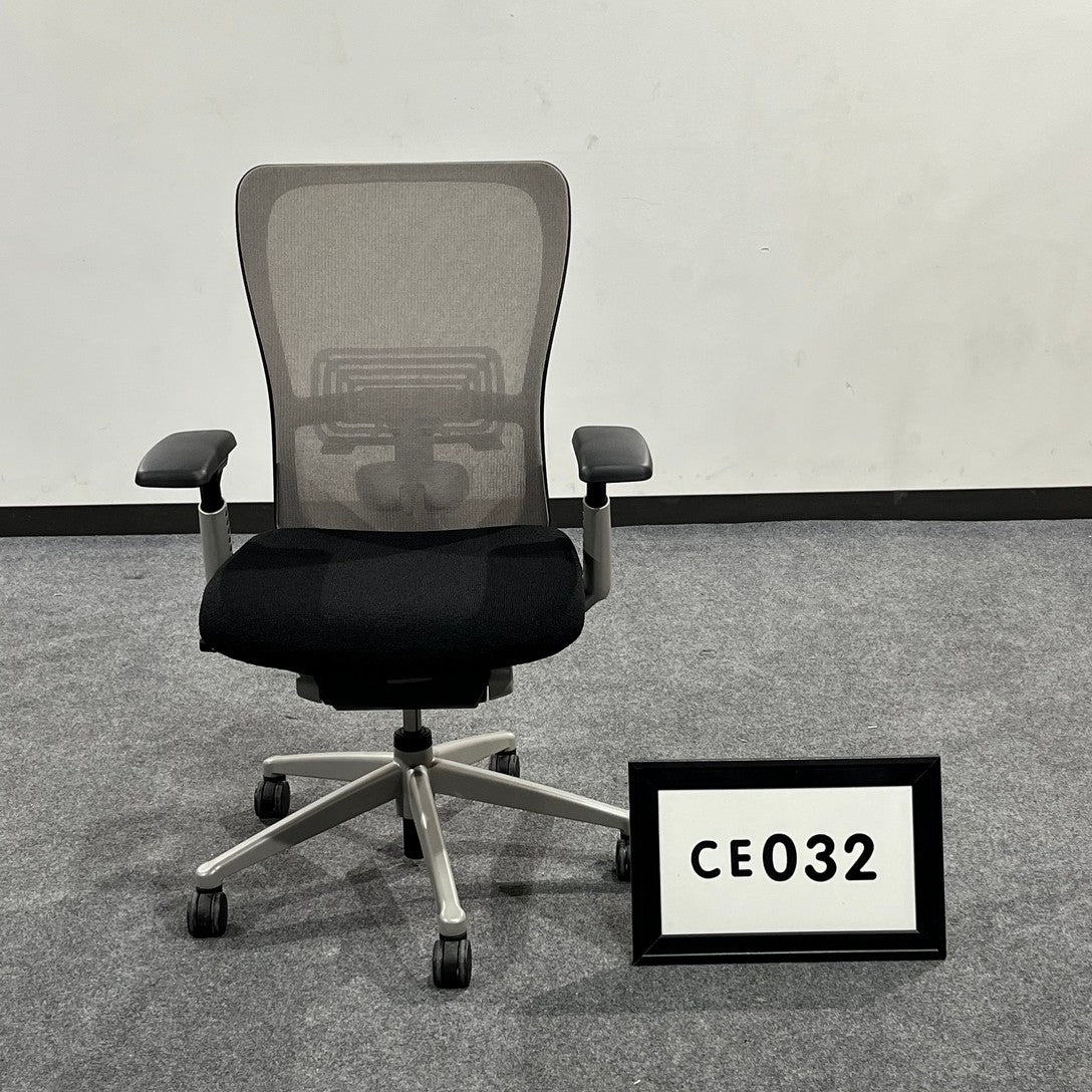Haworth Zody Executive Chair Black seat-gray back with adjustable arms and seat slider