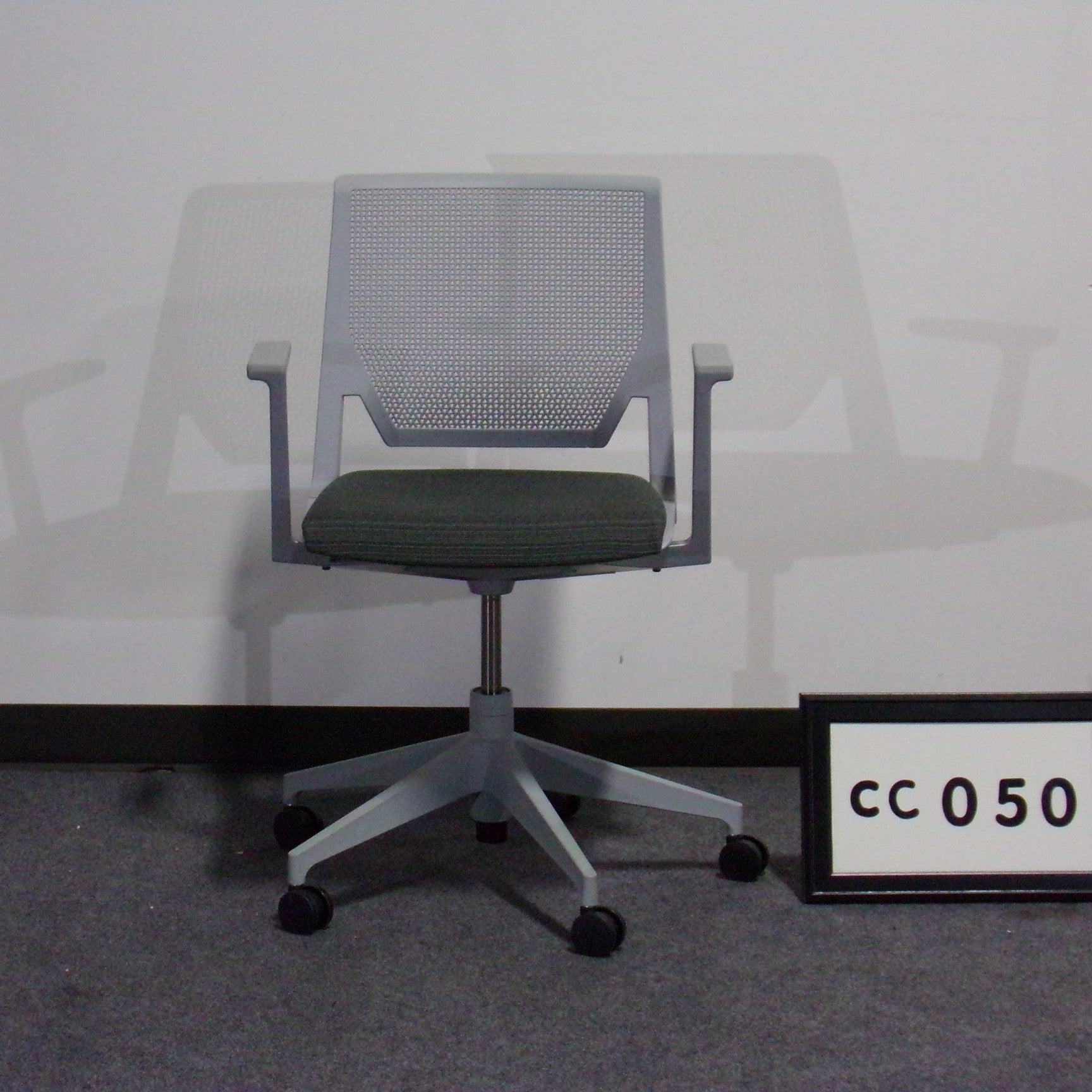 Haworth Very Chair Charcoal fabric seat Gray poly frame with 5-star base, casters