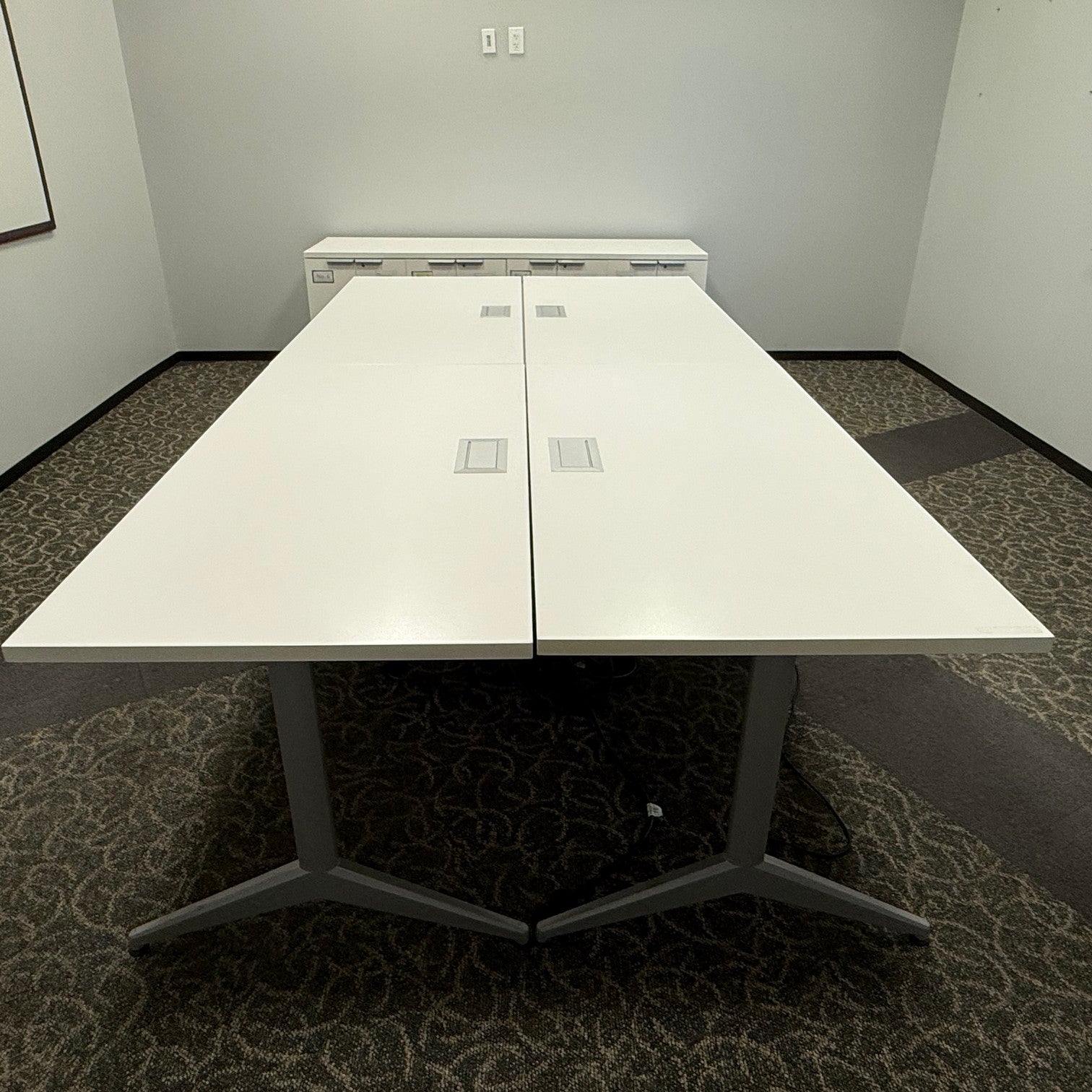 White laminate Coference table with 4  power modules 8' x 3.5' with silver base