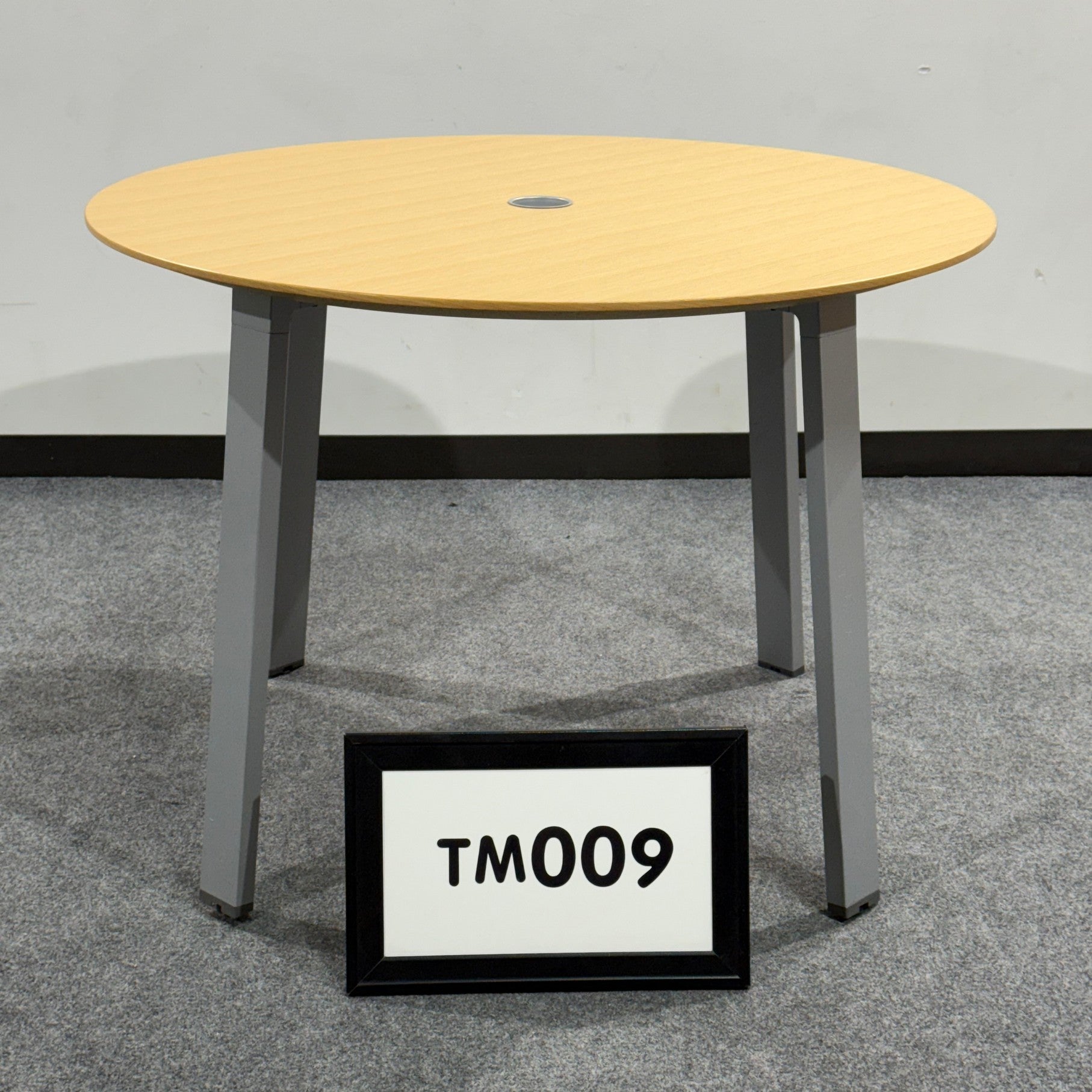 Meeting table, 42" maple laminate with grommet amd 4 post silver legs