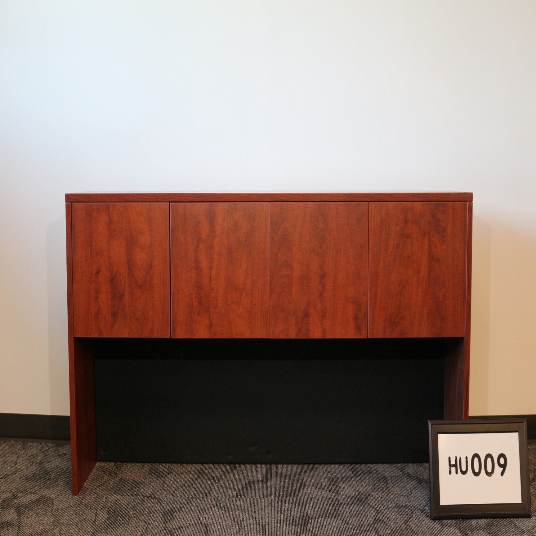 Hutch Cherry laminate w/4 doors and task lighting. 71" x 36" x 15"