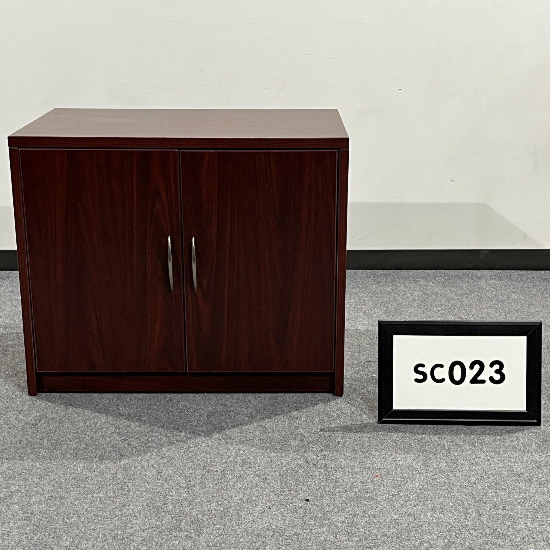 Friant Storage Cabinet Mahogany Laminate w/2 doors and silver handles. 36"W x 22.5"D x 30"H