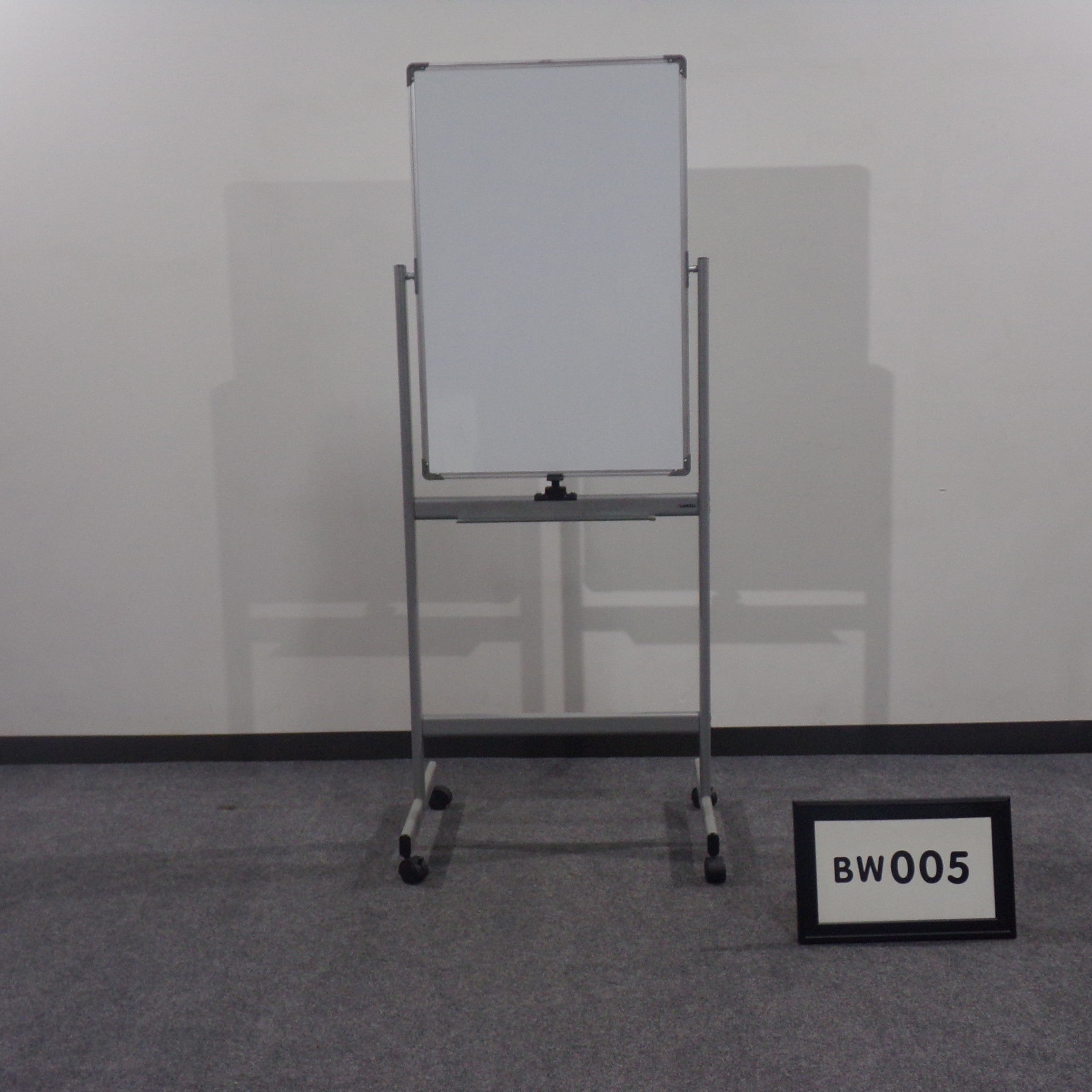 Mobile white board. double sided, magnetic, locking casters