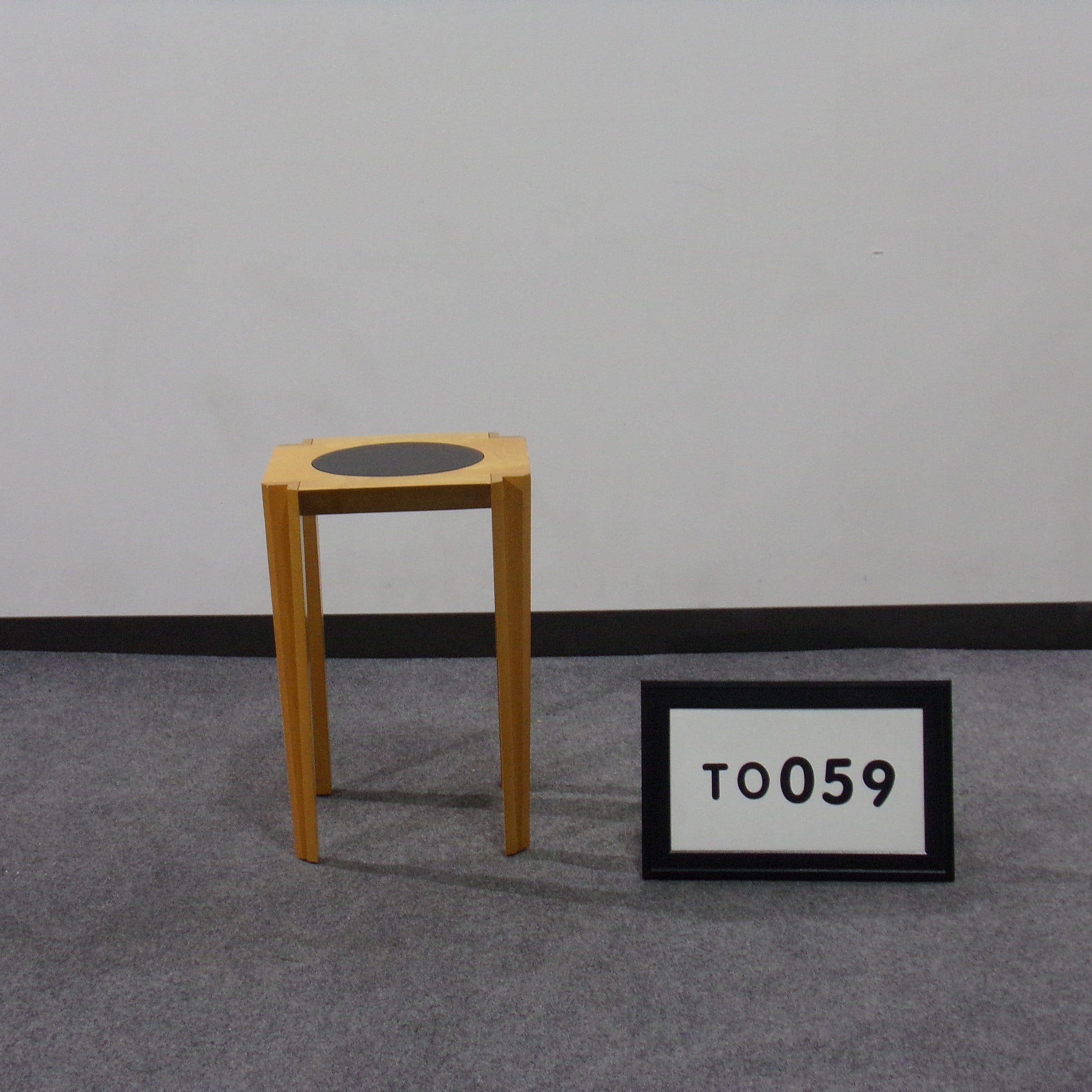 Occasional Table, golden cherry wood with black circle
